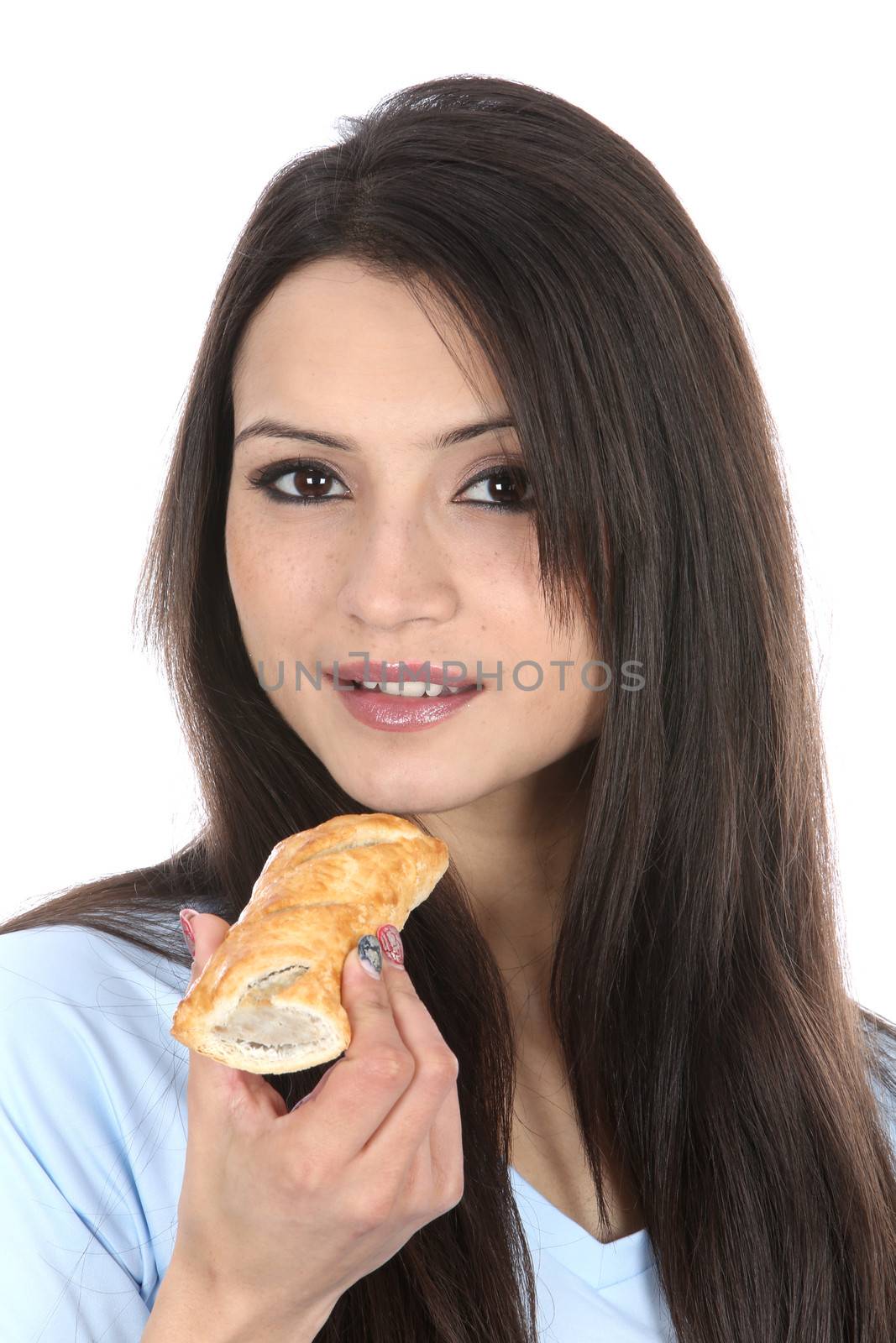 Model Released. Woman Eating Sausage Roll