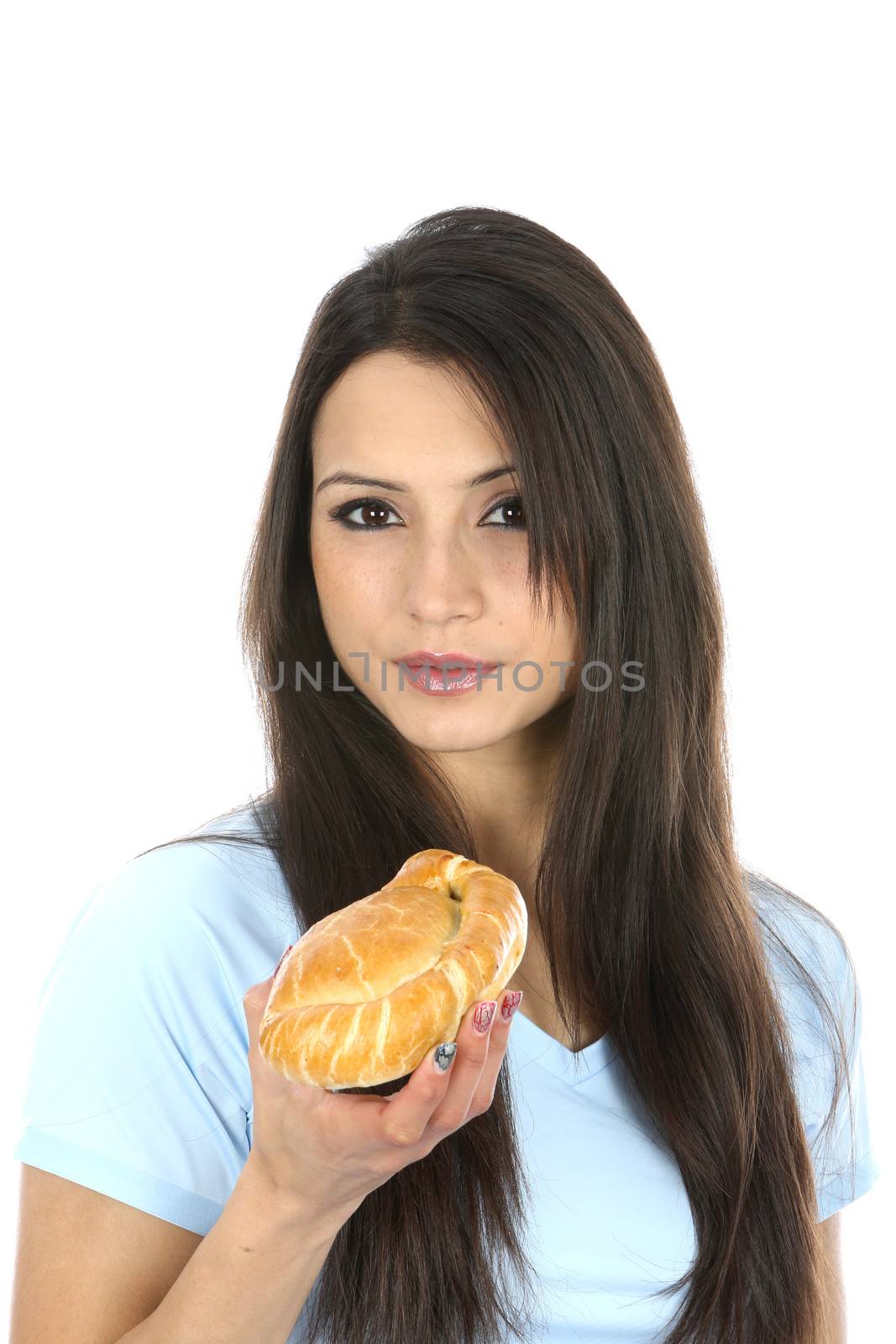 Model Released. Woman Eating Cornish Pasty