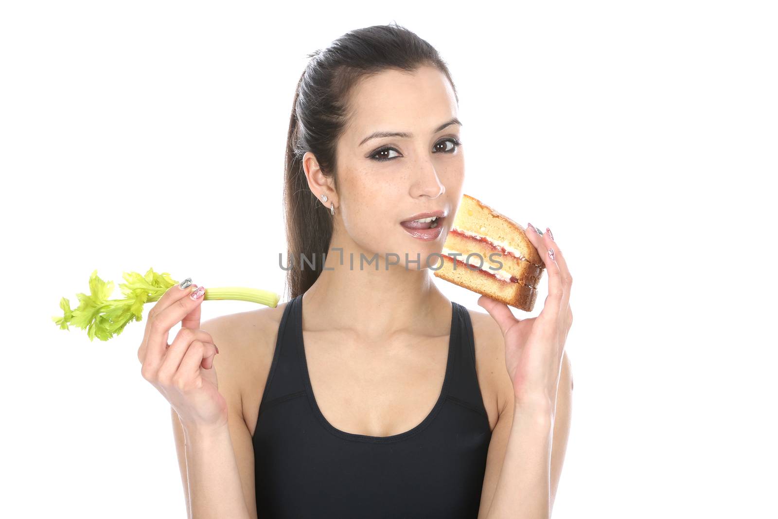 Model Released. Woman Holding Cake and Celery