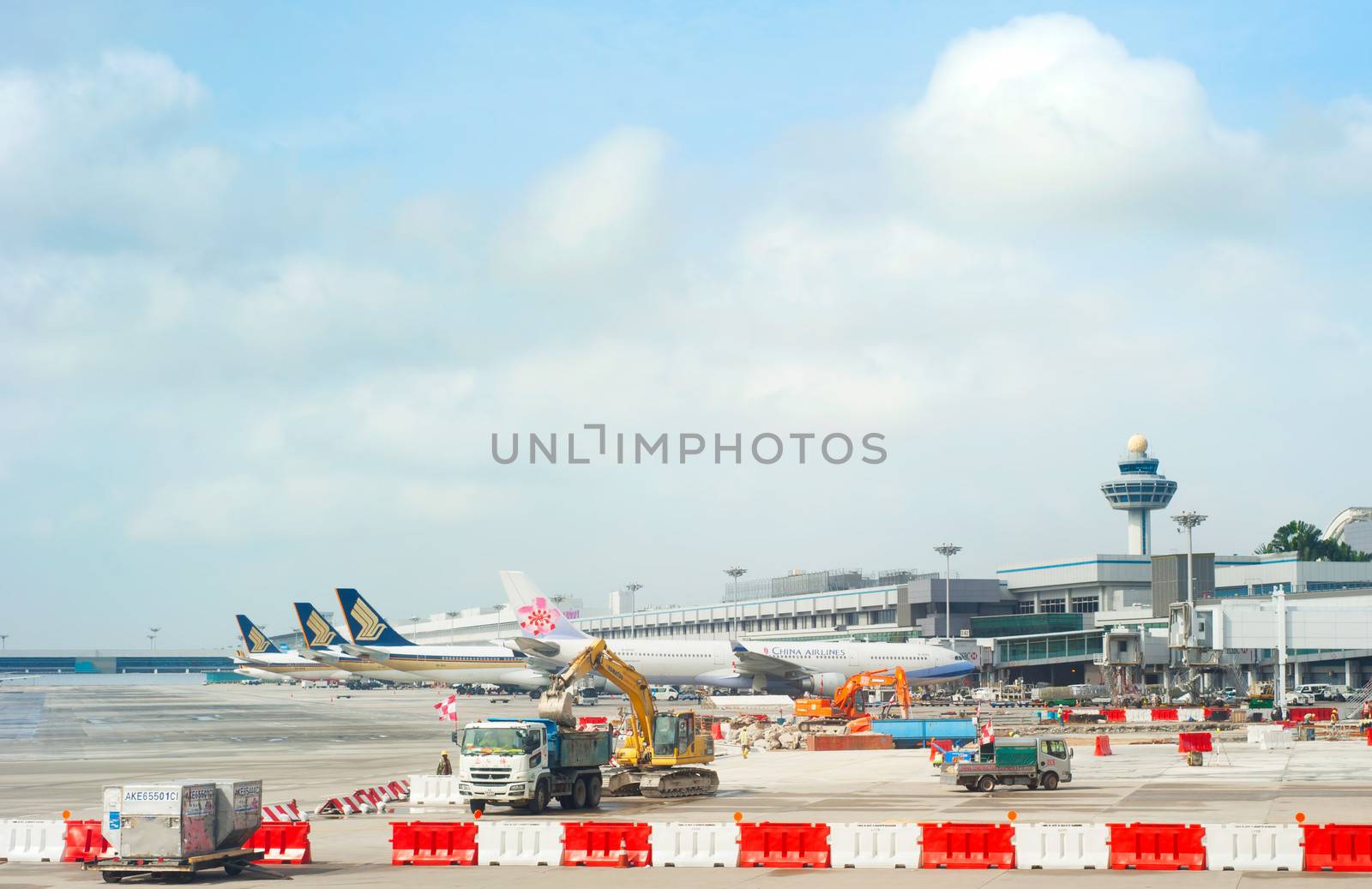 SINGAPORE - MARCH 05 : Construction site at Changi International Airport on March 05, 2013 in Singapore. Changi Airport serves more than 100 airlines operating 6,100 weekly flights connecting Singapore to over 220 cities