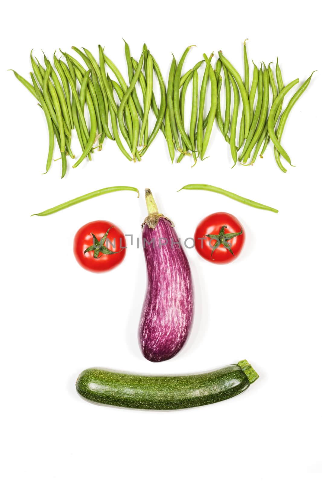 vegetables face on white background