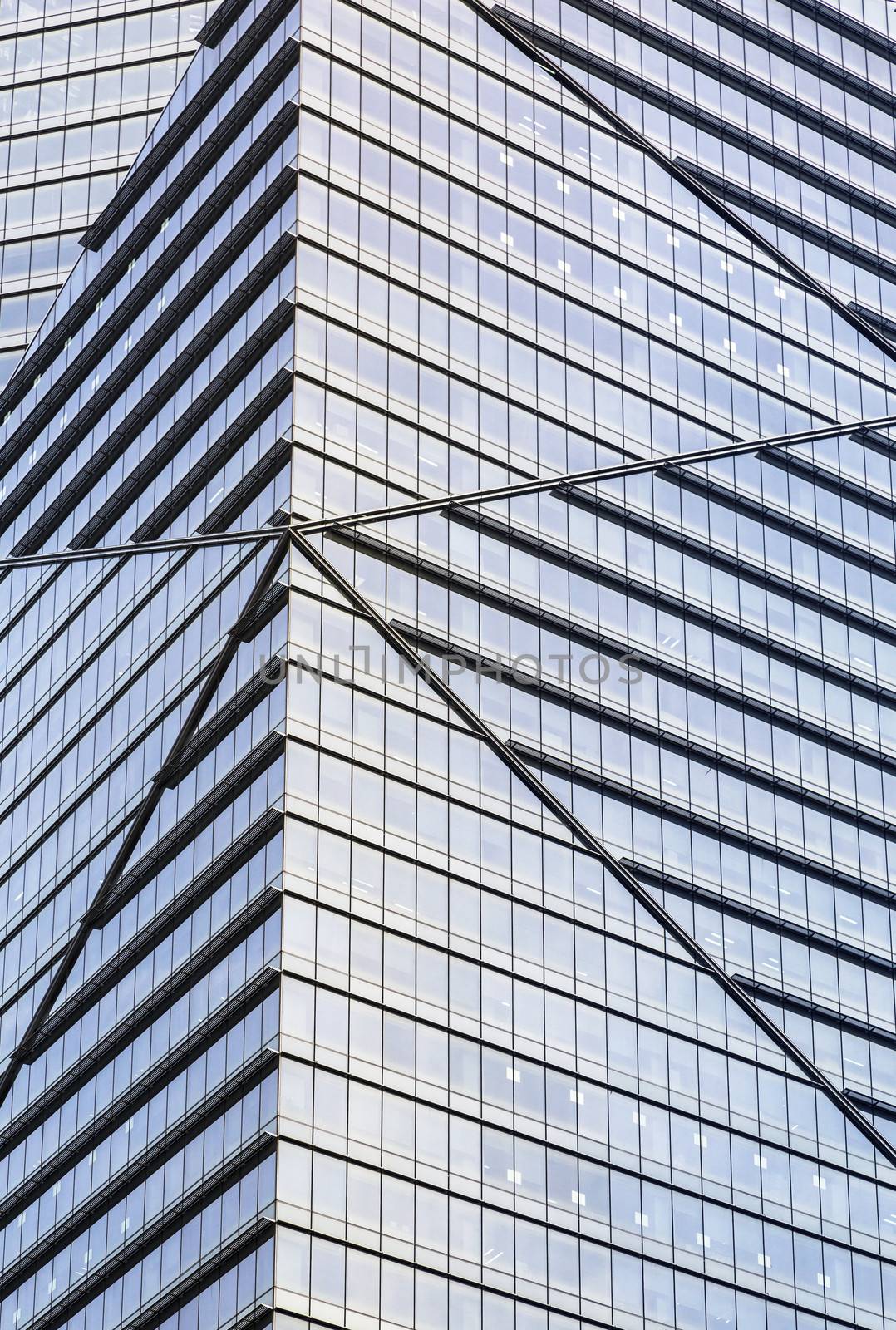 Close up vertical shot of a office building.