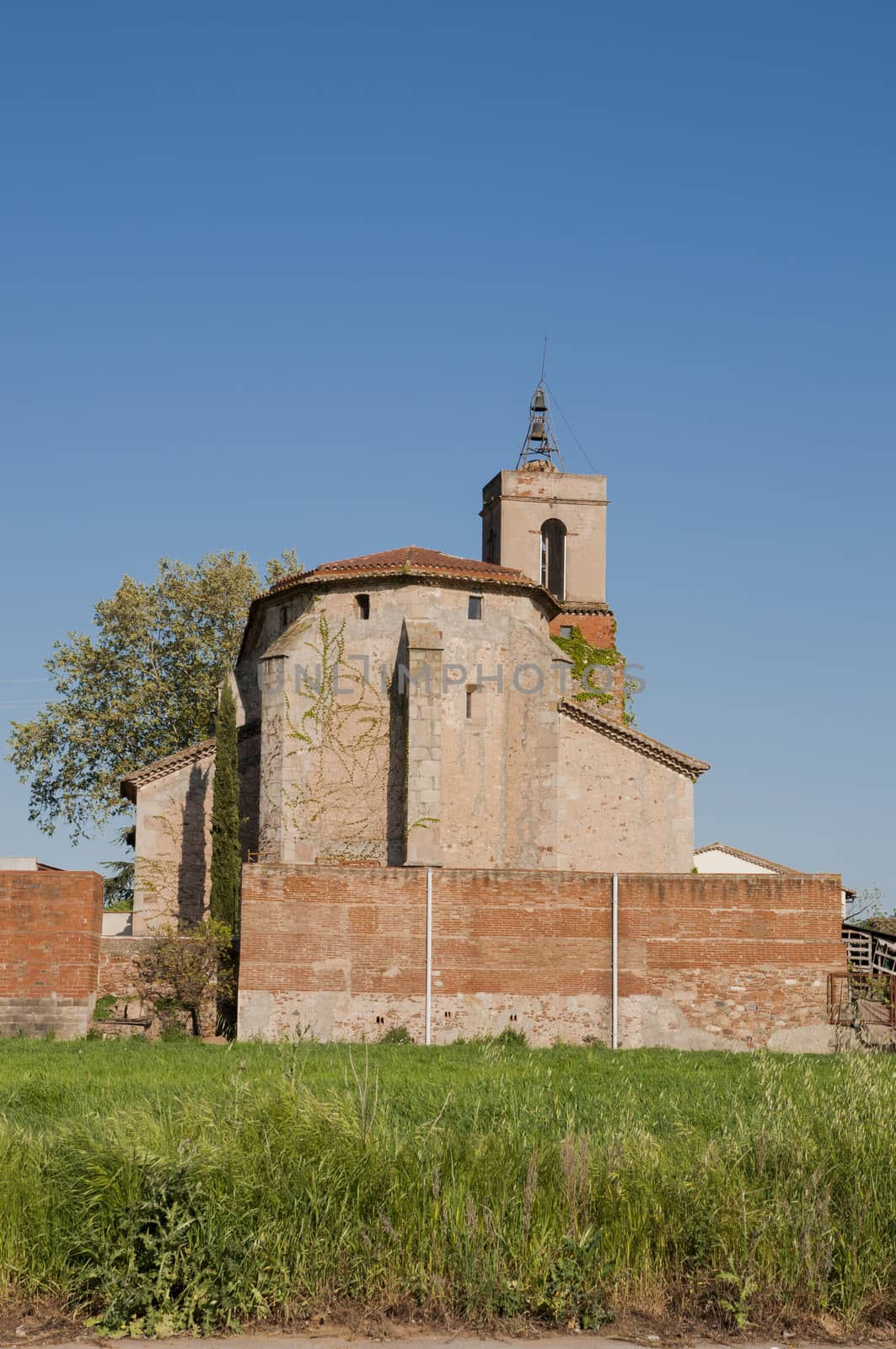 ancient church surrounded by vegetation Granollers