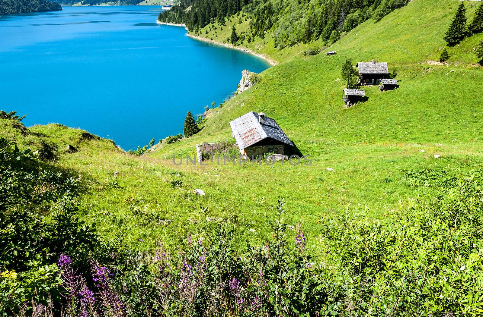 famous Roselend lake in alpine mountains, savoy, France