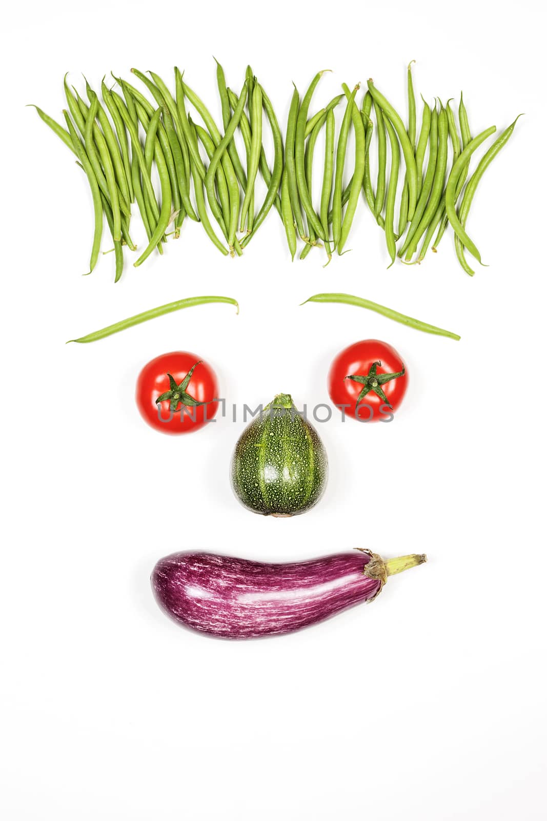 Vertical happy face with vegetables on white background