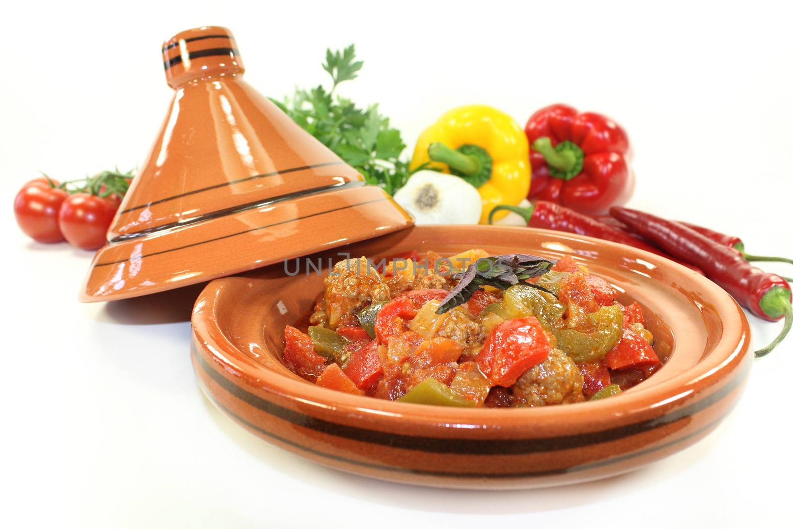 oriental vegetables pan with peppers, tomato and meatballs