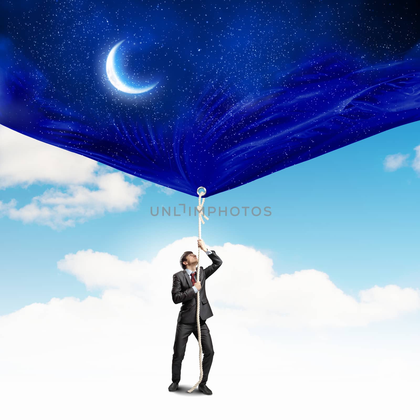 Image of businessman pulling banner with illustration. Day and night concept