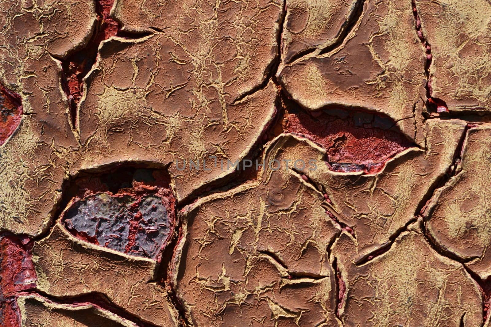 background or texture of brick red color cracks on the paint surface