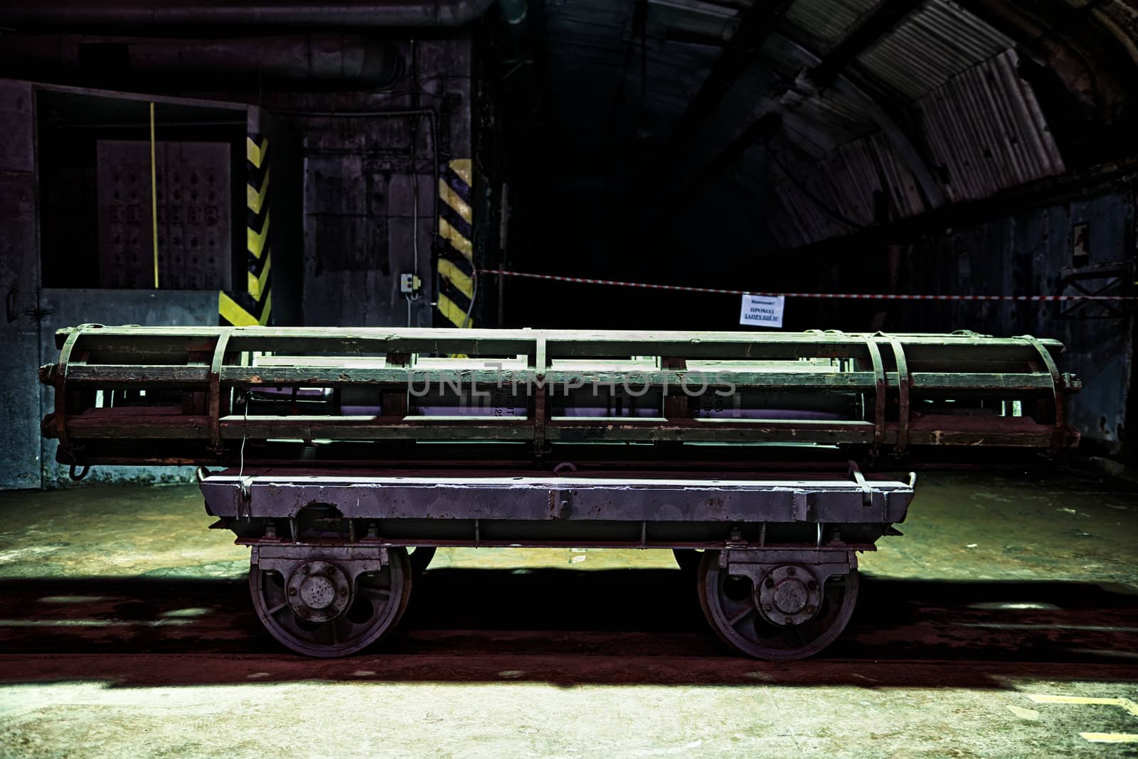 gun shell on a transport cart .