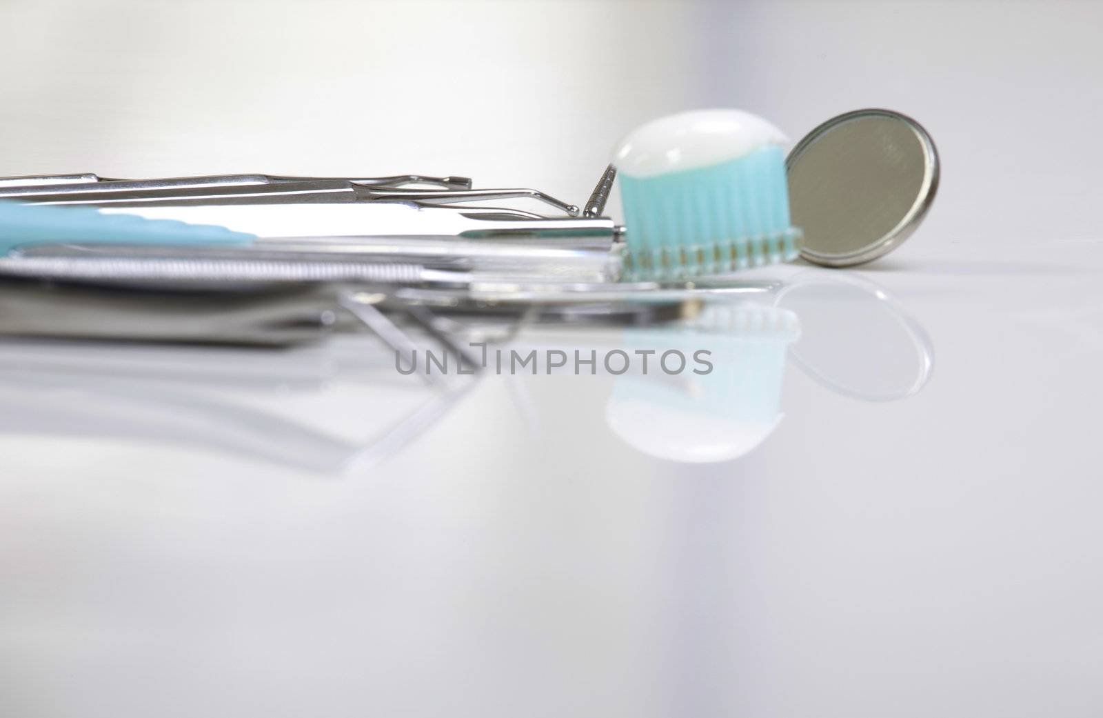 dental health care, toothbrush and mirror