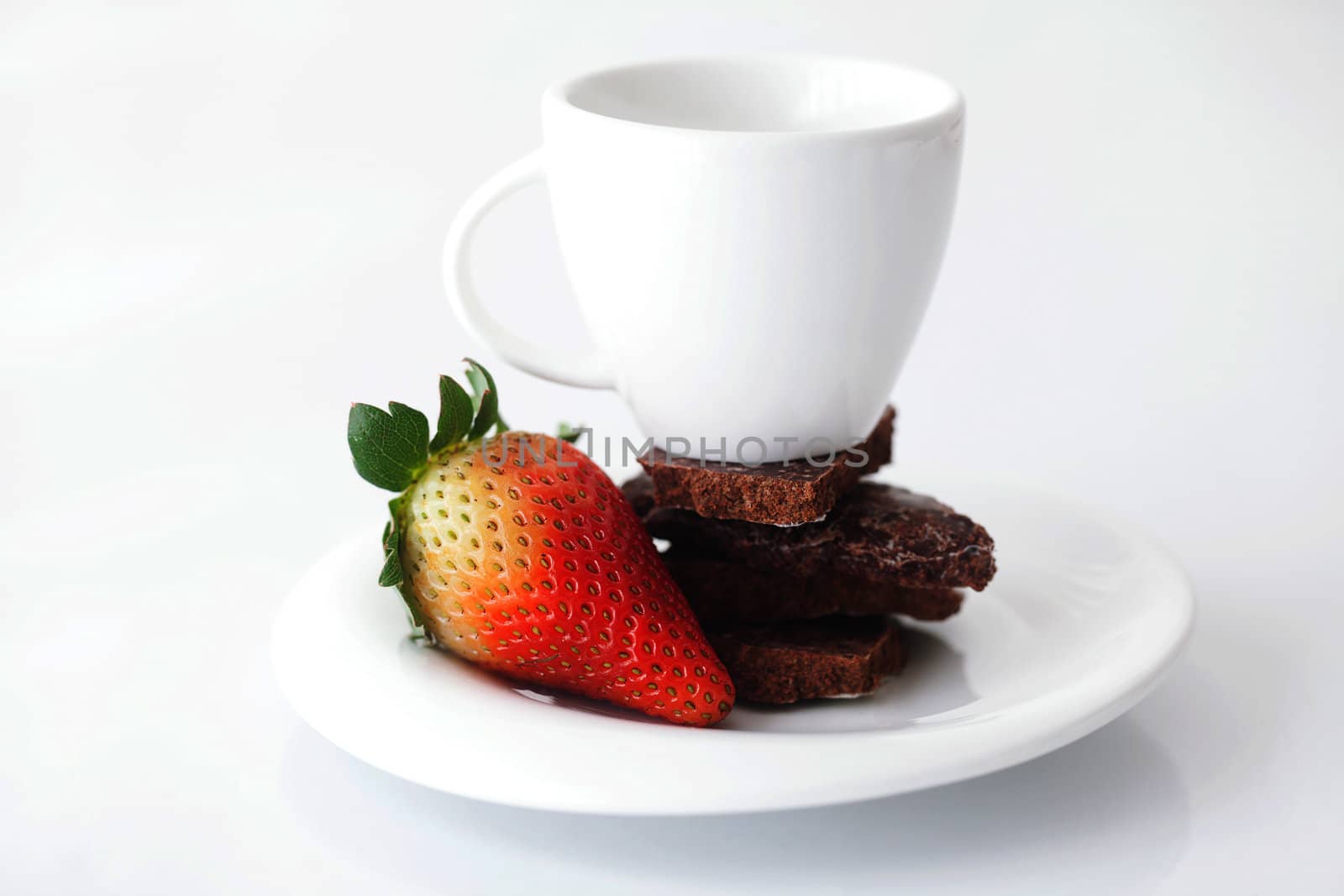 white cup with saucer, chocolate and strawberry by jannyjus