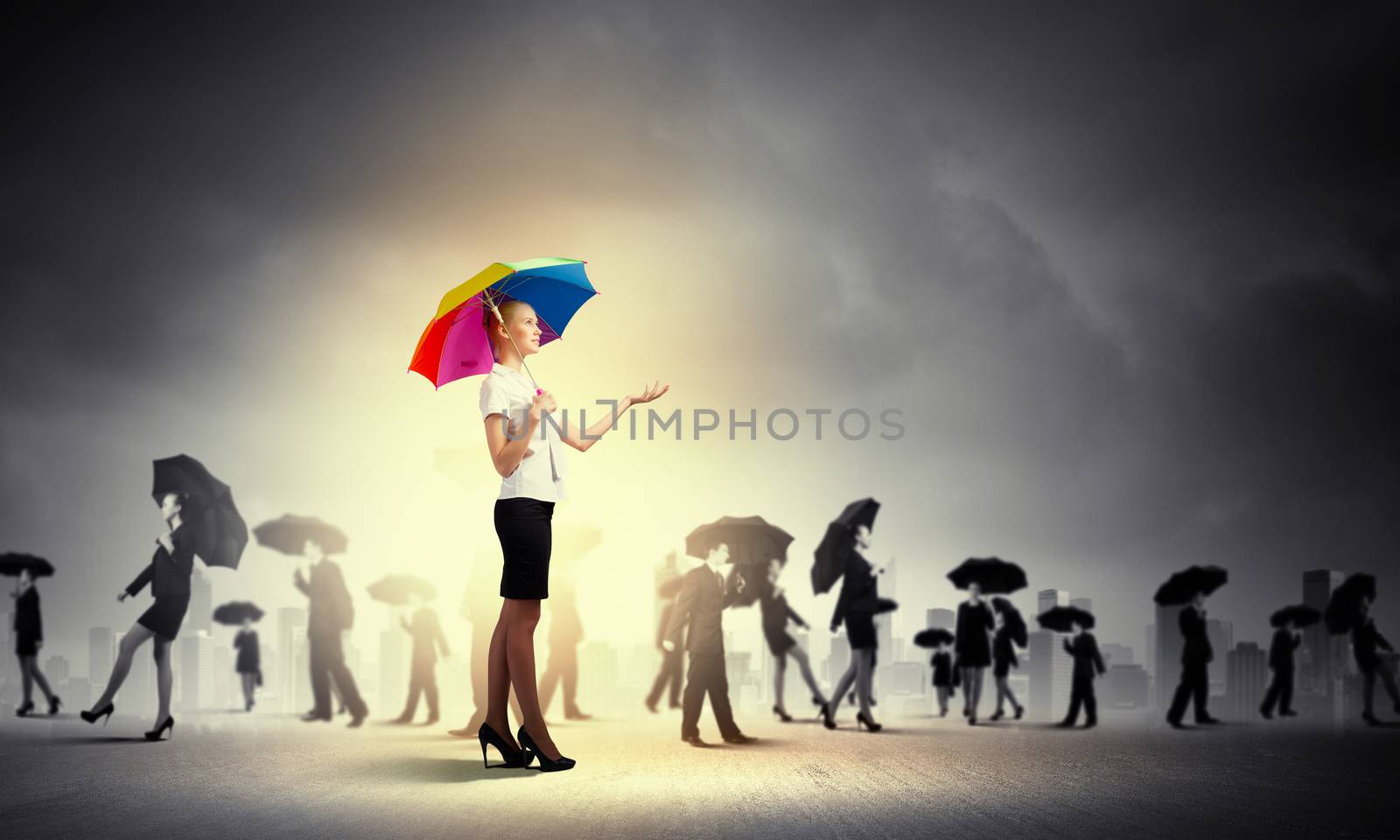Businesswoman with umbrella by sergey_nivens