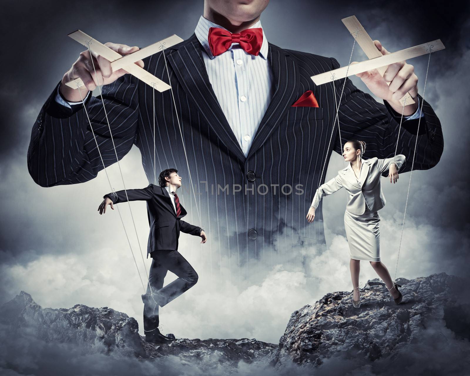 Image of young businessman puppeteer. Leadership concept