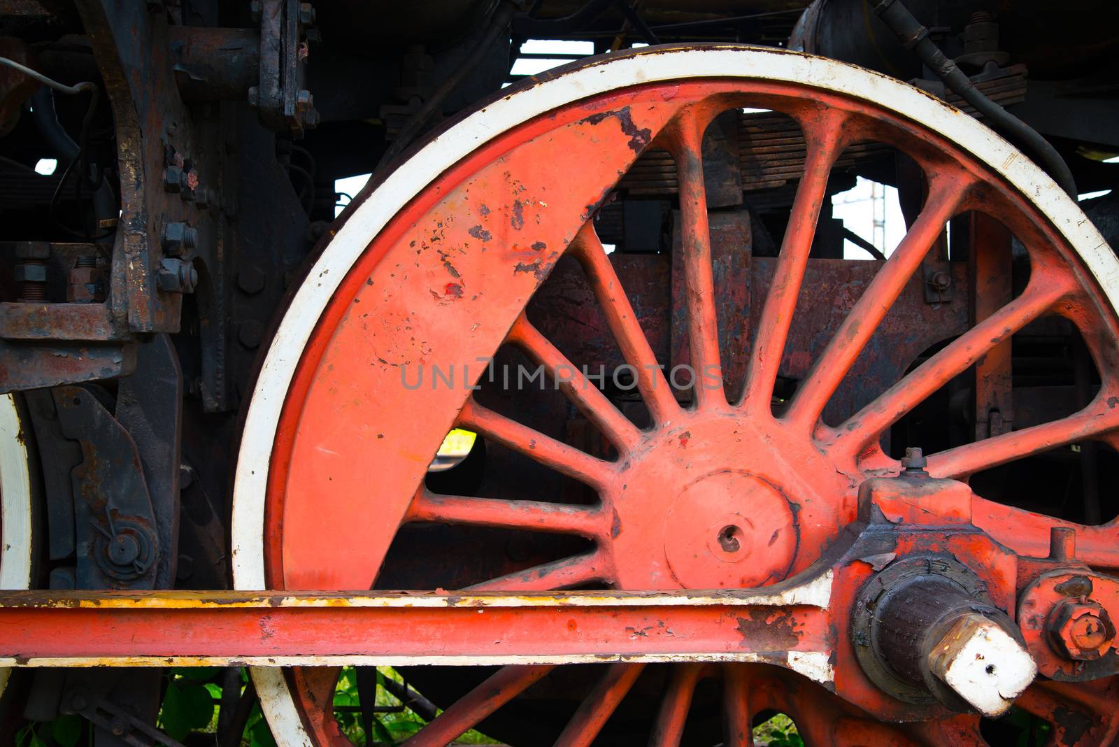 Fragment of old locomotive's wheel - old and rusty