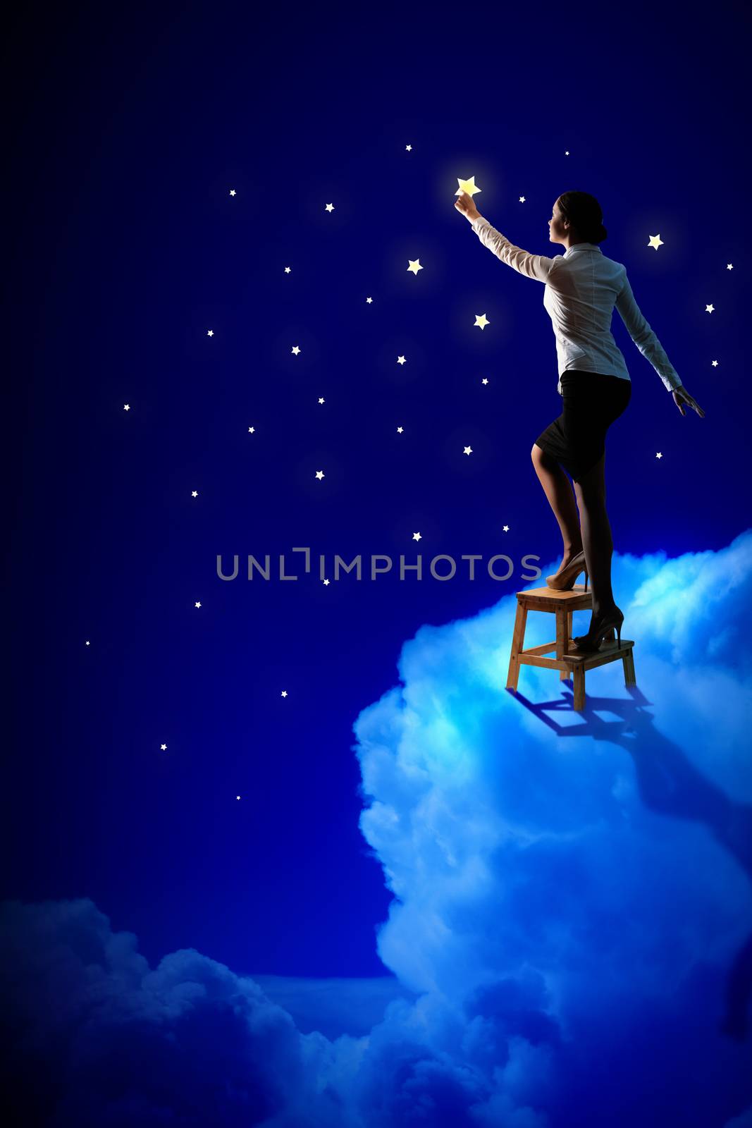 Woman lighting stars by sergey_nivens