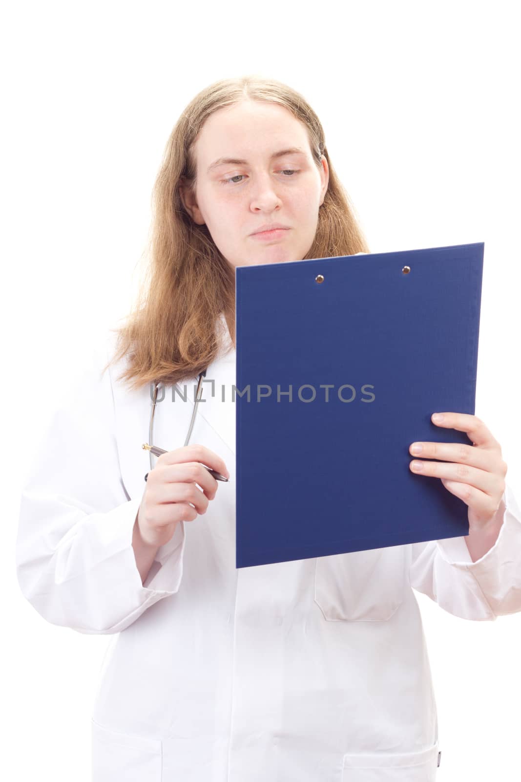 Very busy female doctor reading patients record