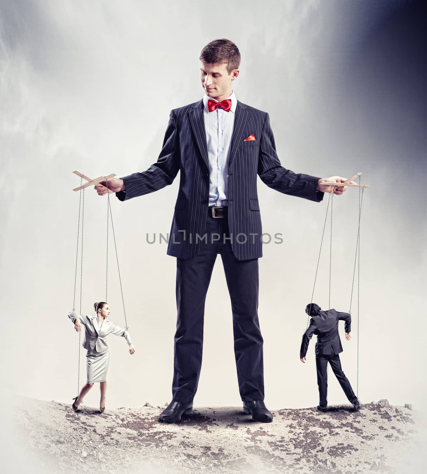 Businessman puppeteer by sergey_nivens