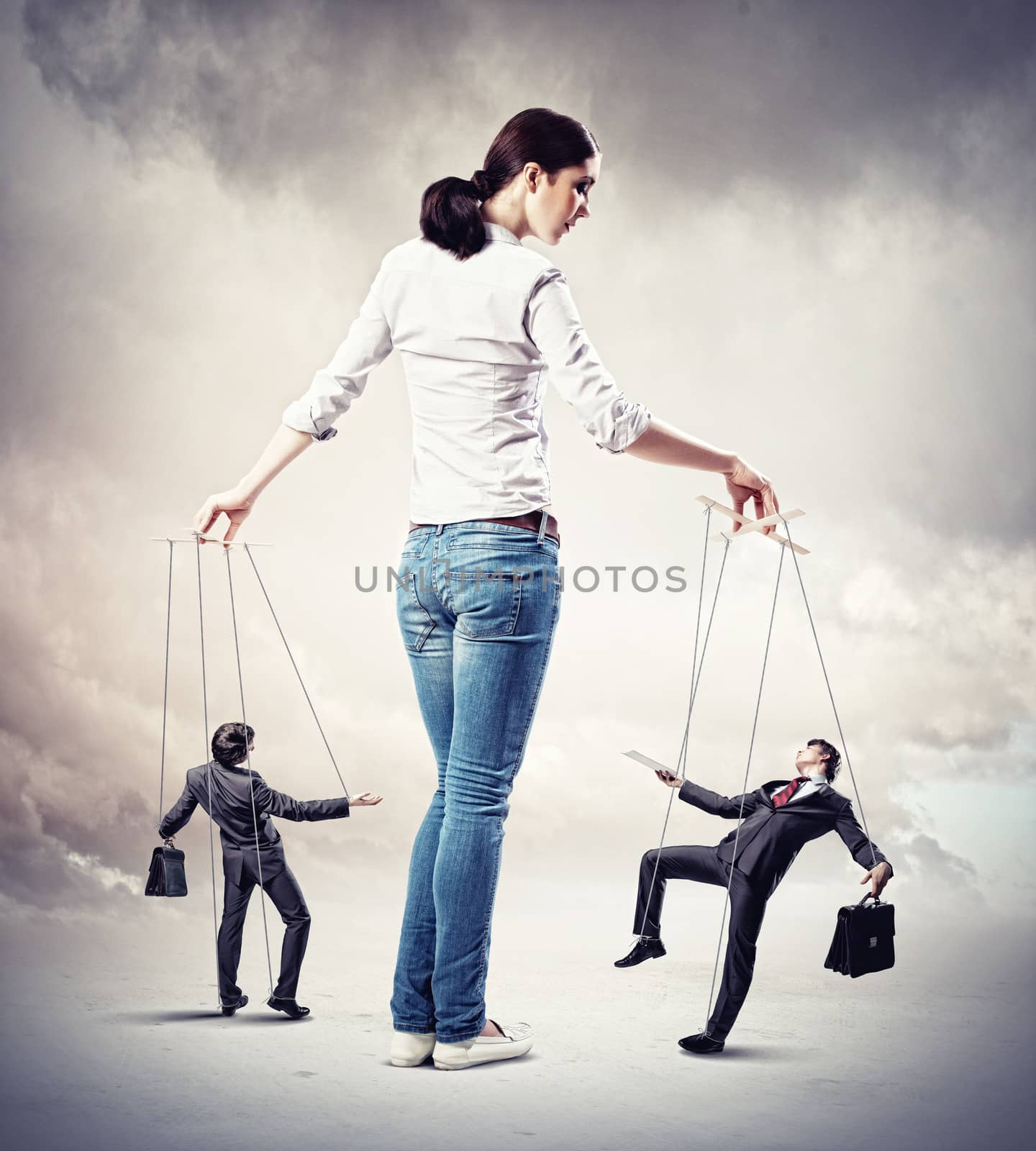 Image of pretty businesswoman puppeteer. Leadership concept