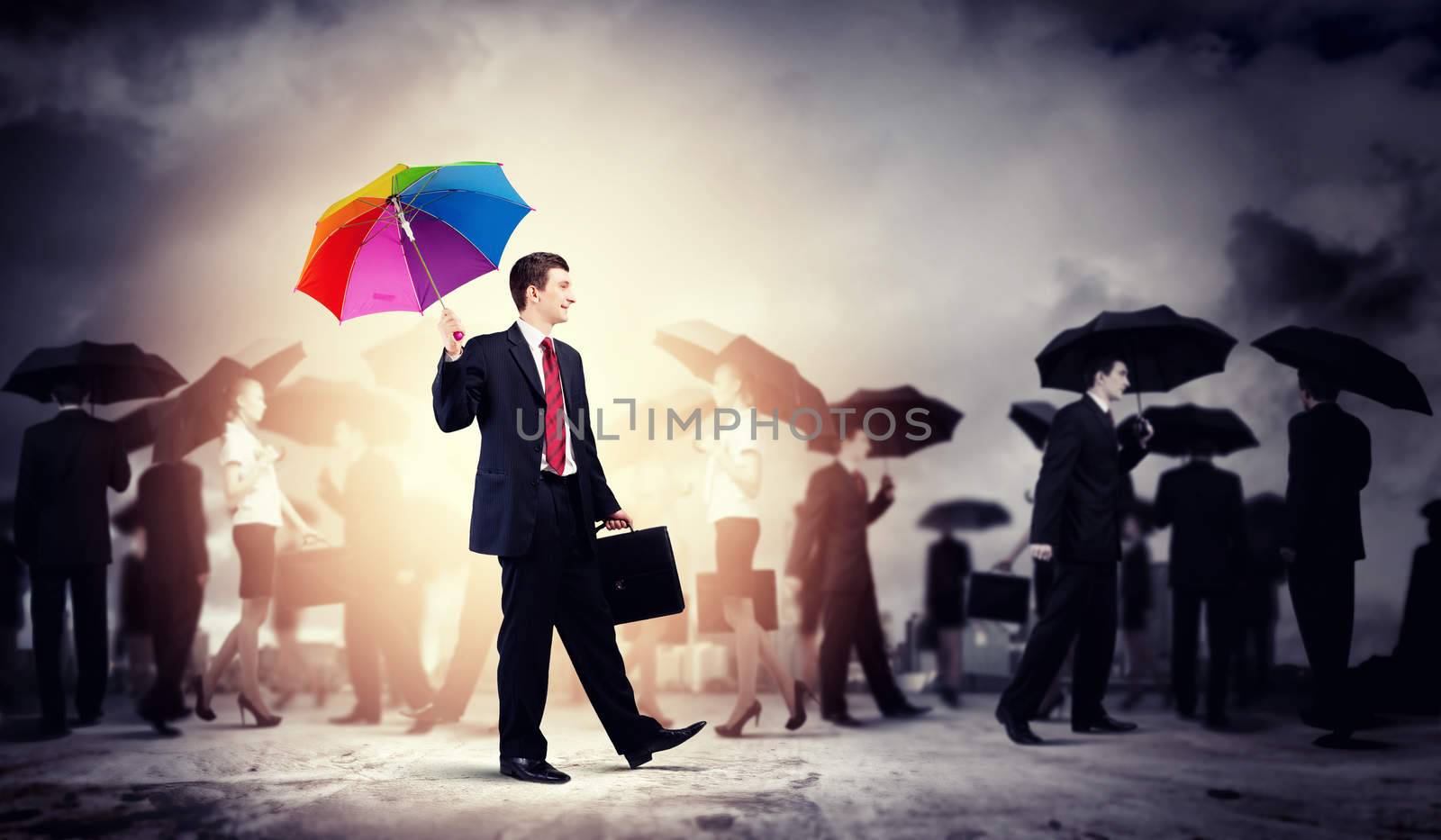 Businessman with umbrella by sergey_nivens