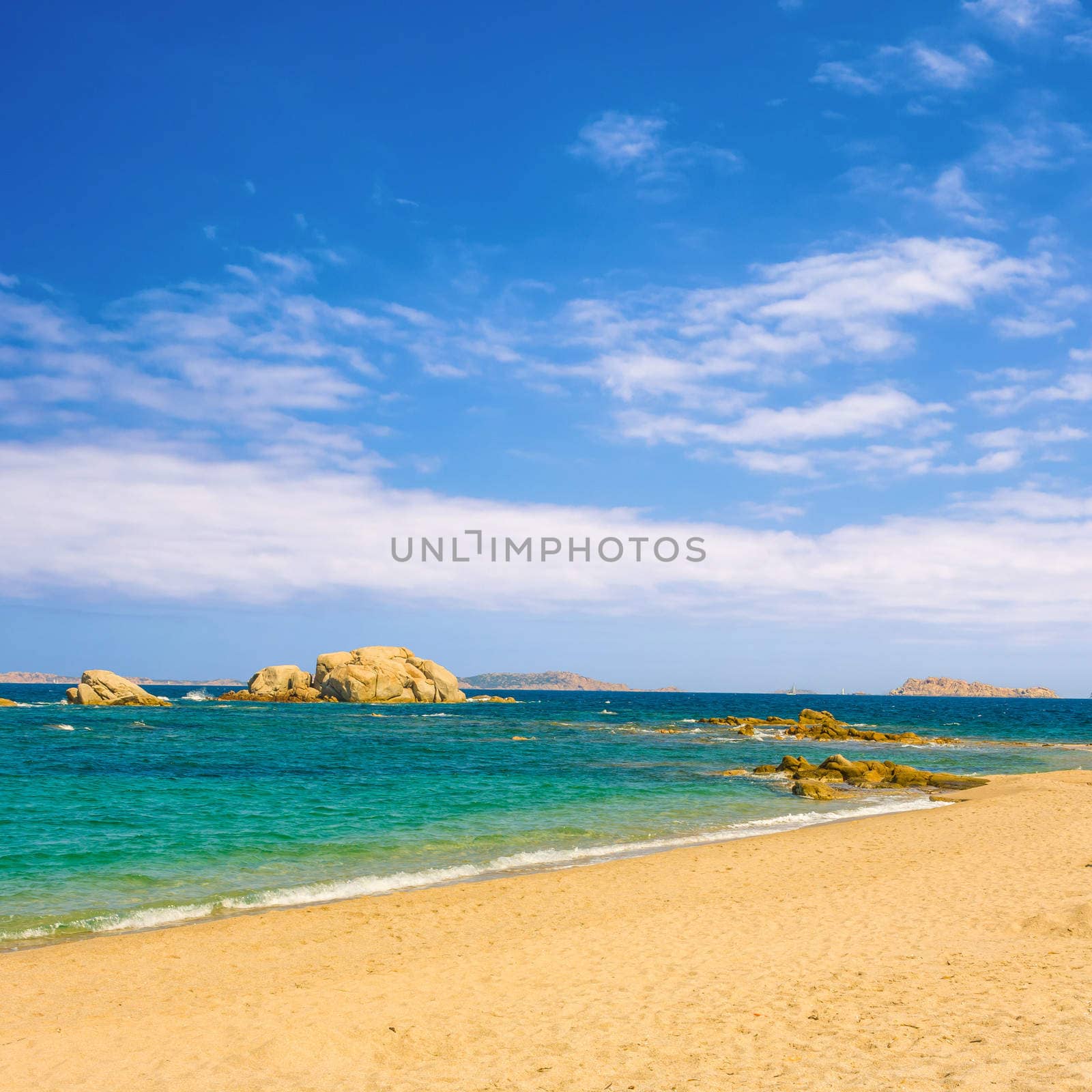 beautiful beach with turquoise water under blue sky