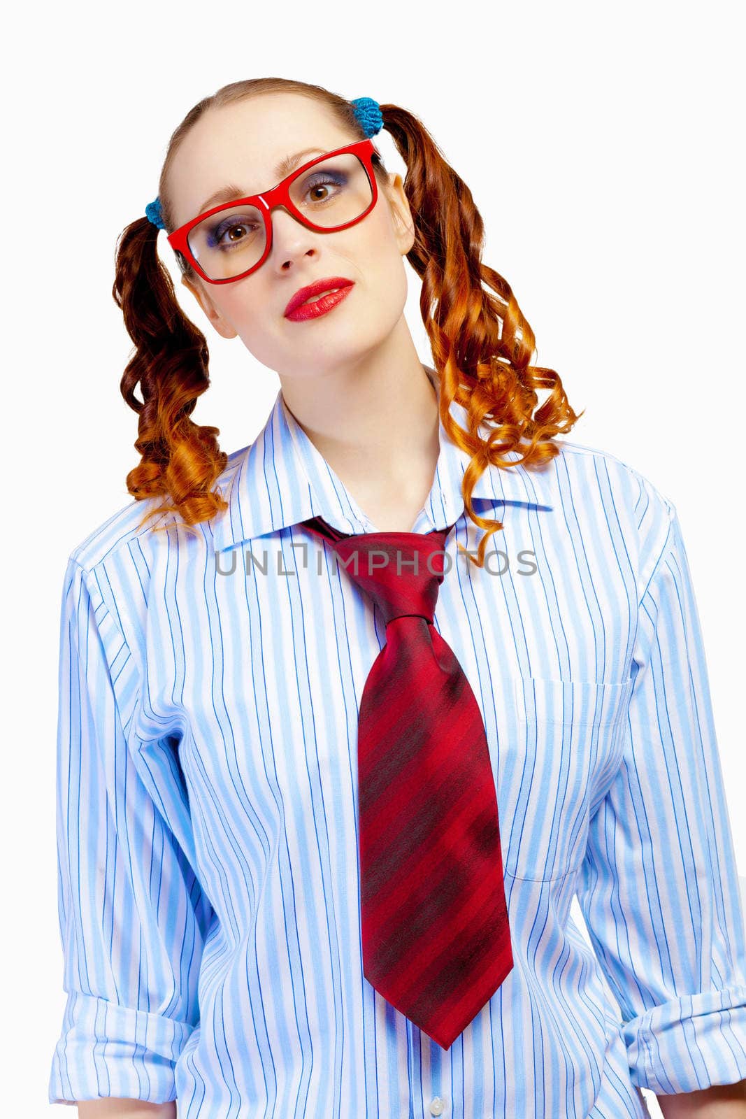 Teenager girl with pigtails in red glasses