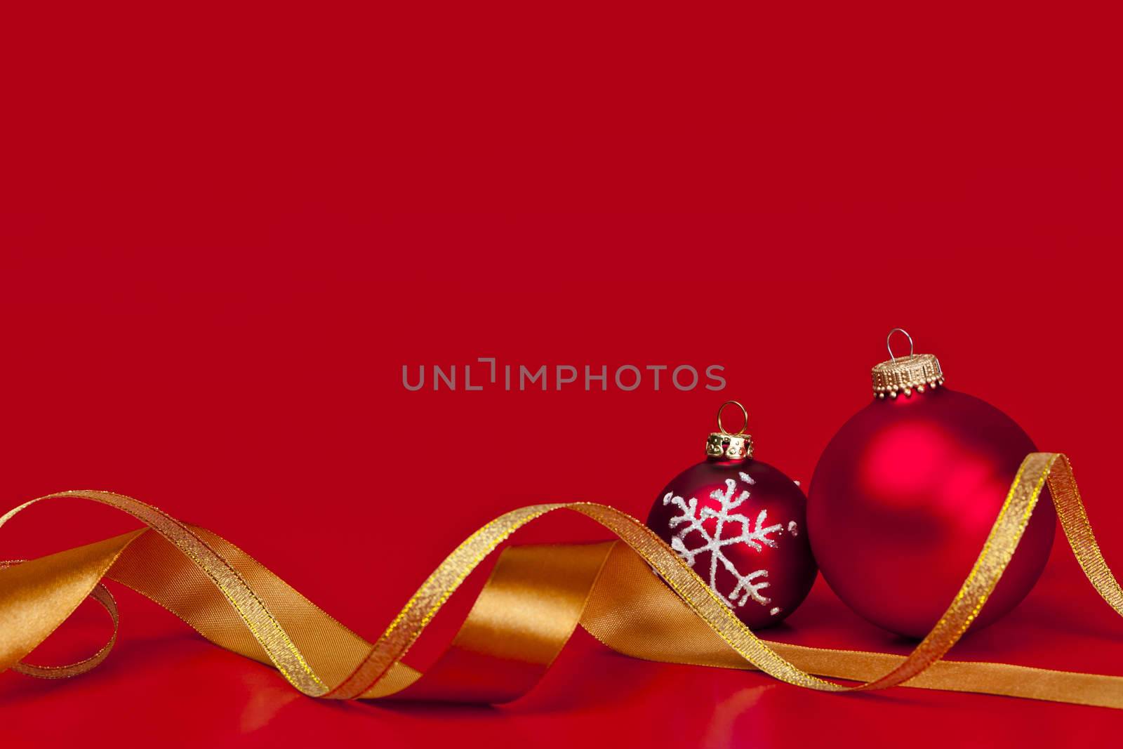 Red Christmas background with ornaments by elenathewise