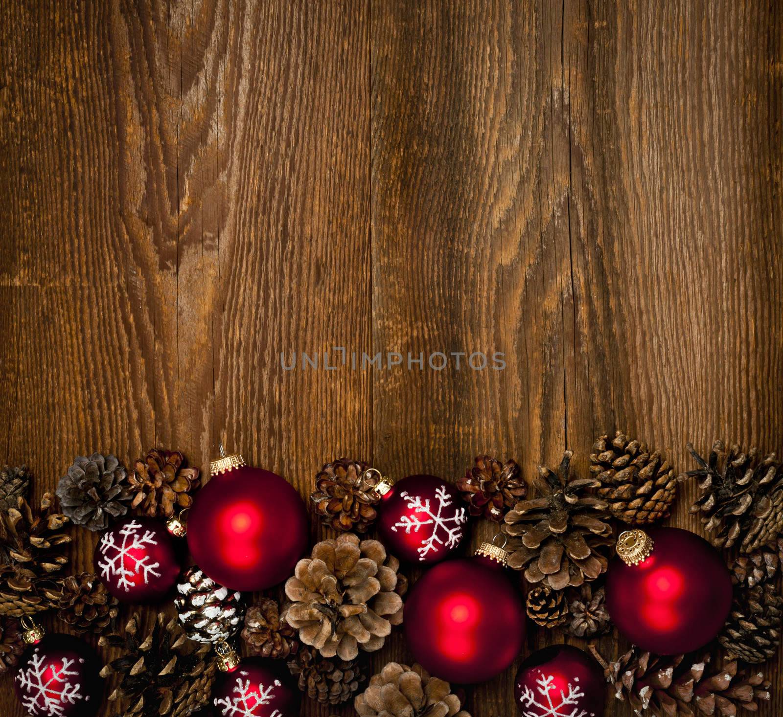 Wood background with Christmas ornaments by elenathewise