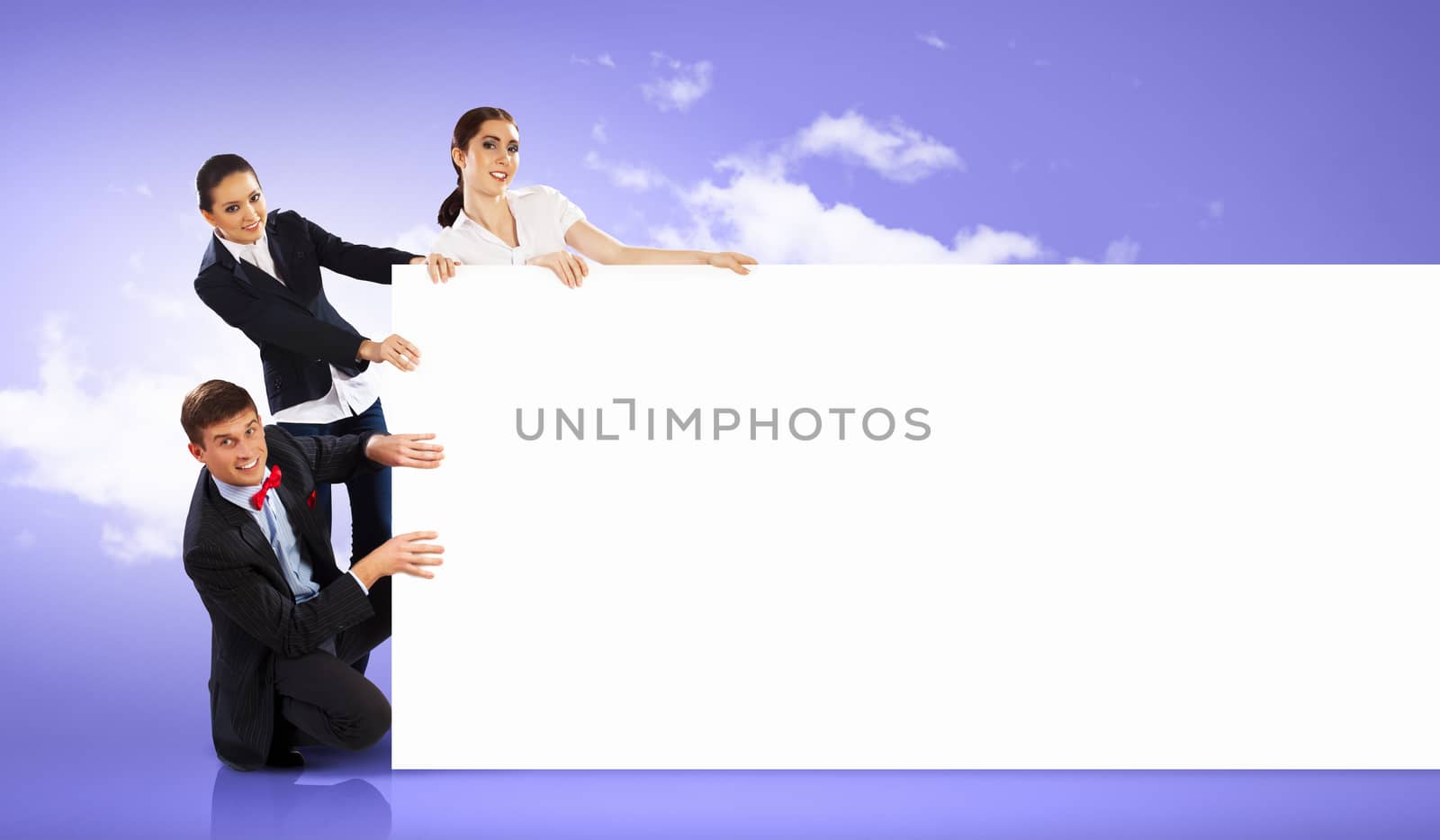 Three young people holding banner by sergey_nivens