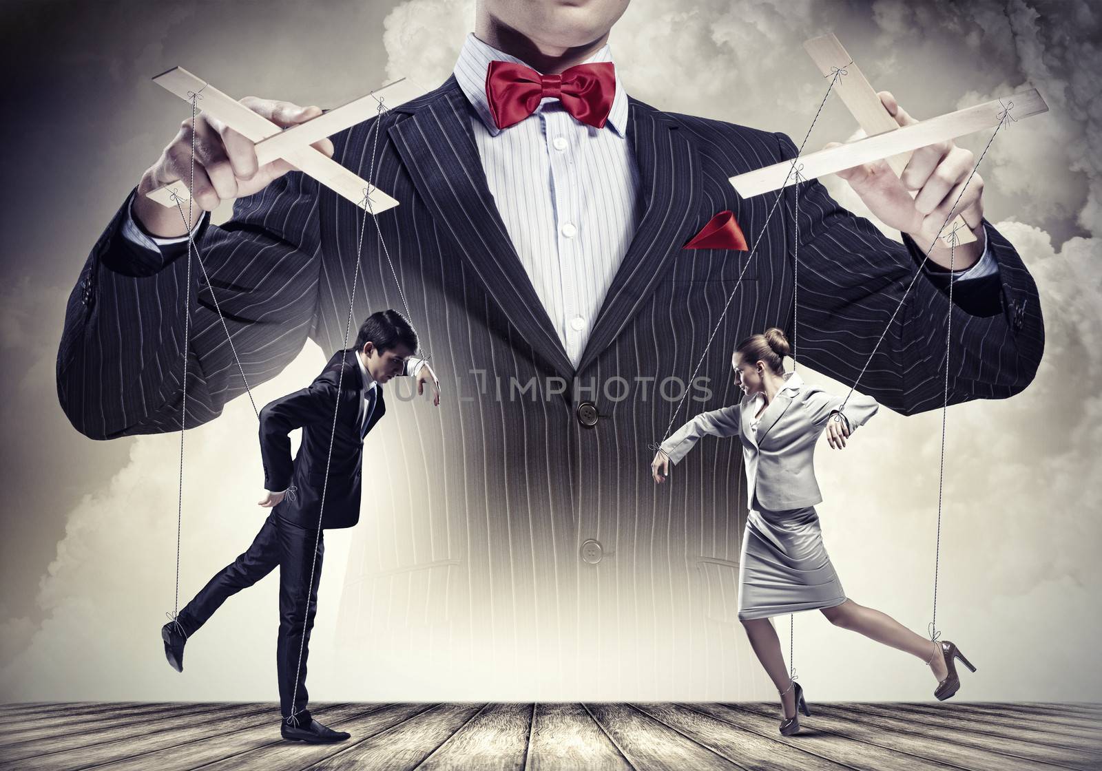 Image of young businessman puppeteer. Leadership concept