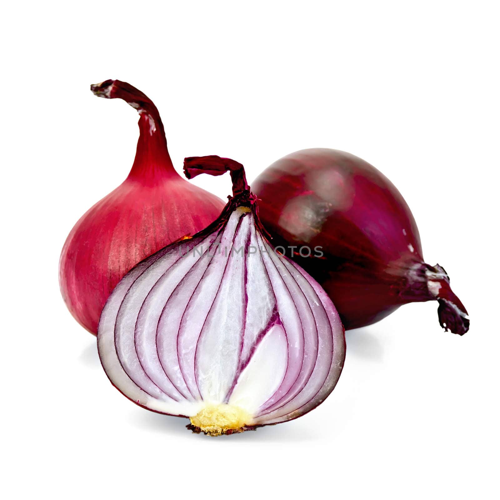 Two whole and one sliced purple onion isolated on a white background
