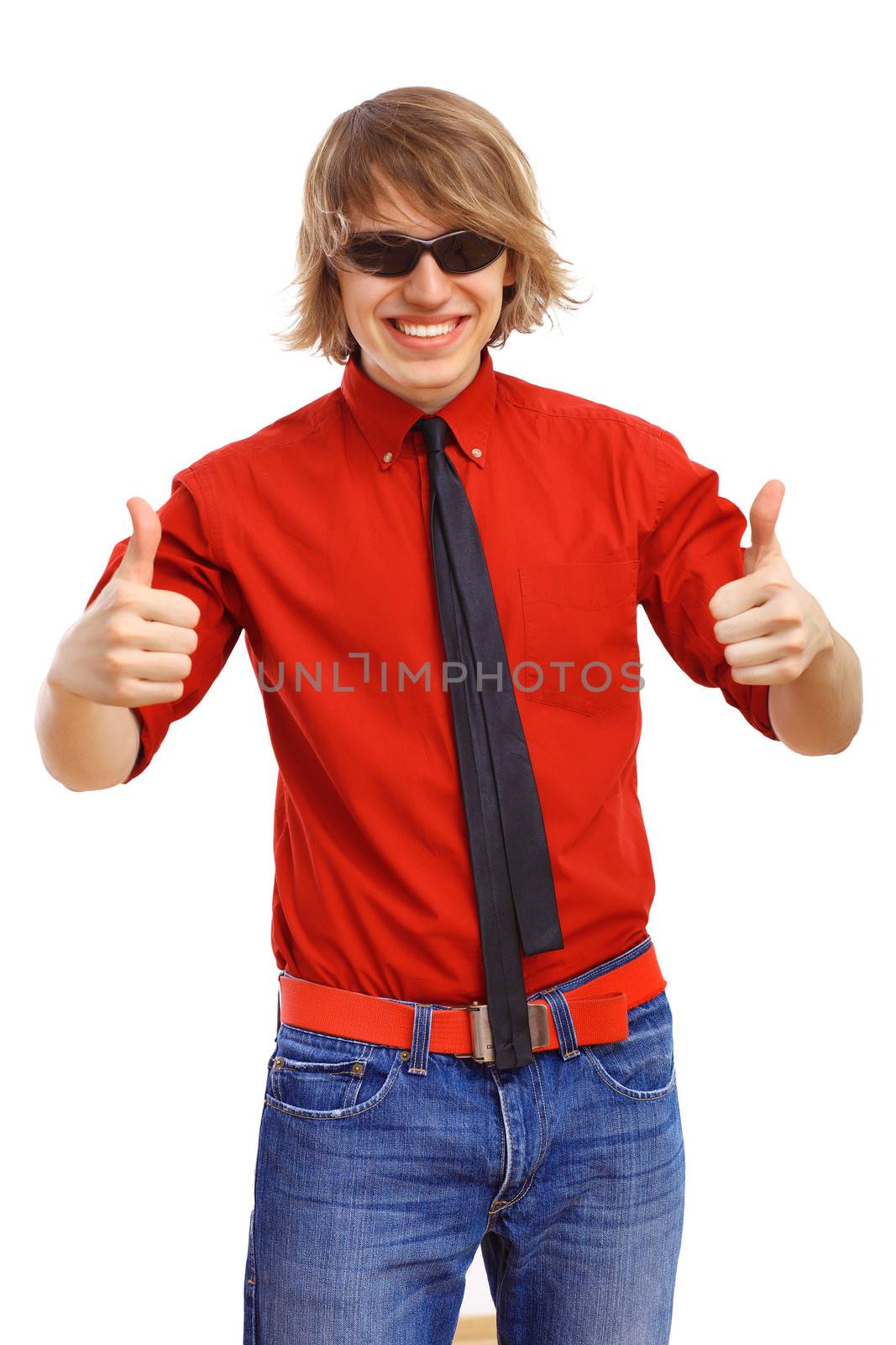 Happy smiling young man dancing and listening to music