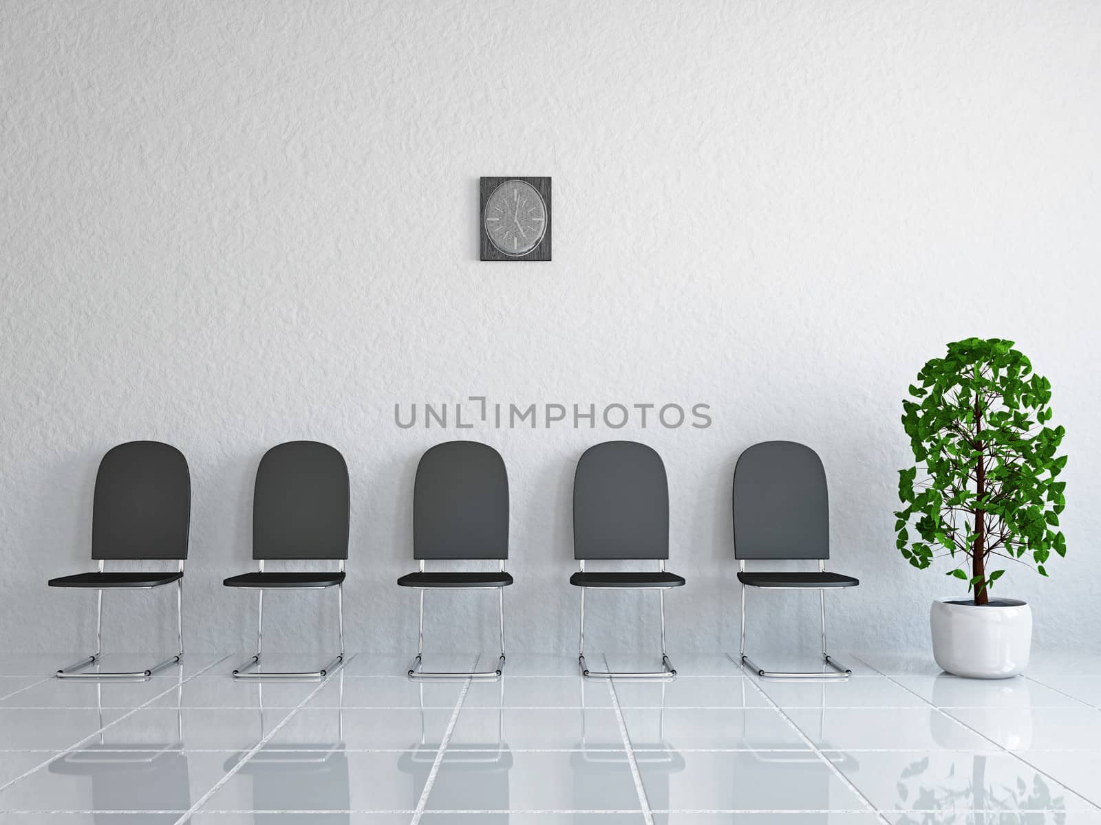 Reception with leather chairs near a wall