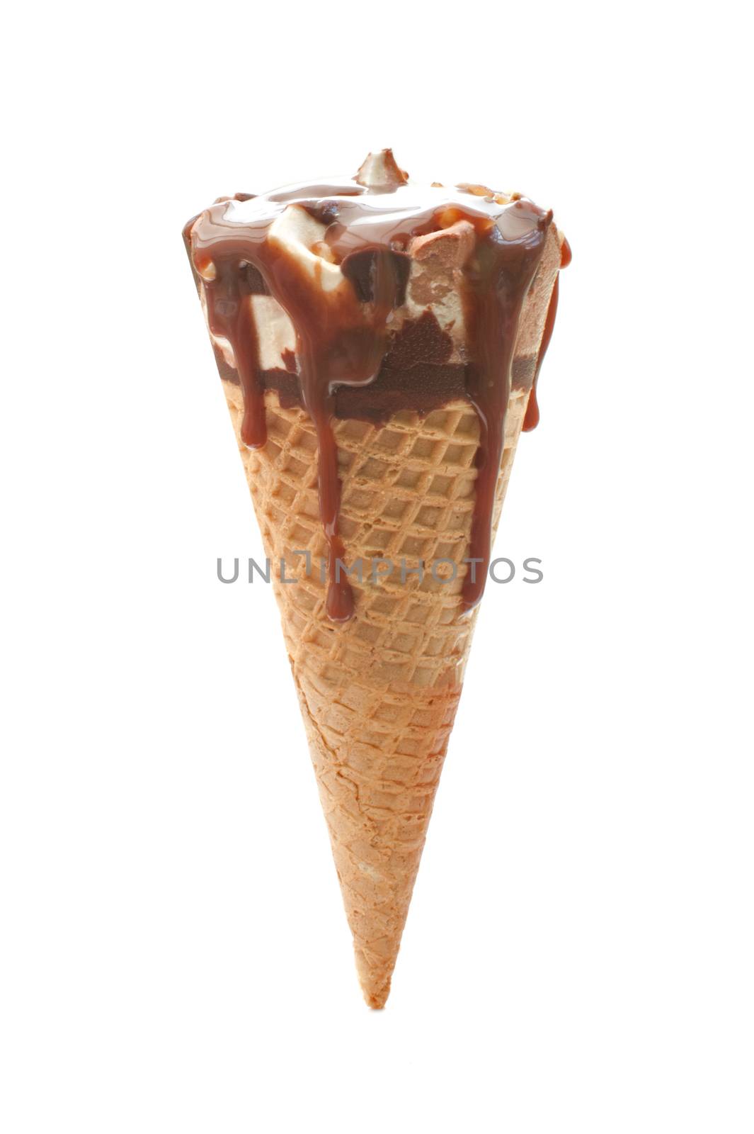 Chocolate icecream in a cone with syrup