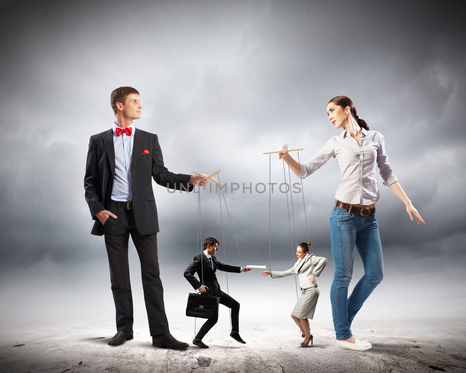 Image of man and woman with marionette puppets