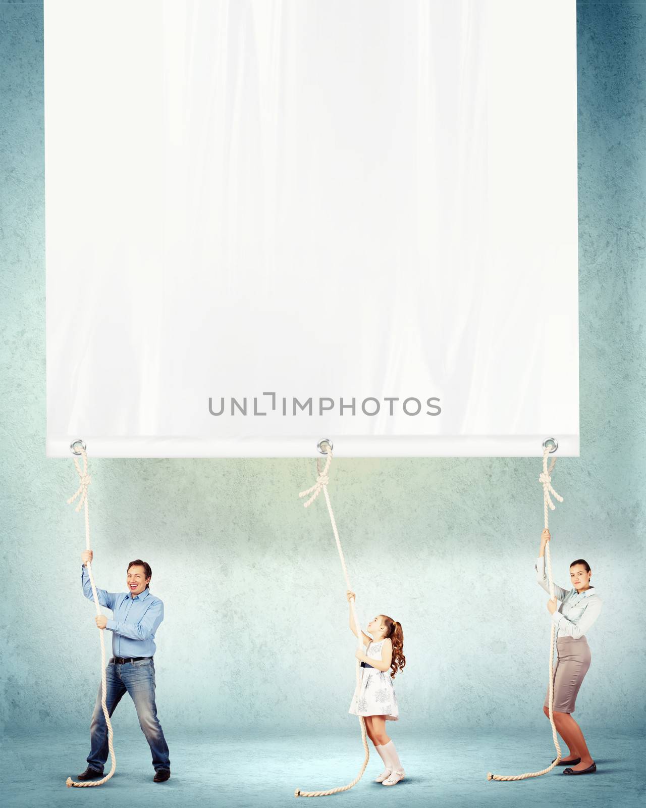 Happy family pulling banner by sergey_nivens