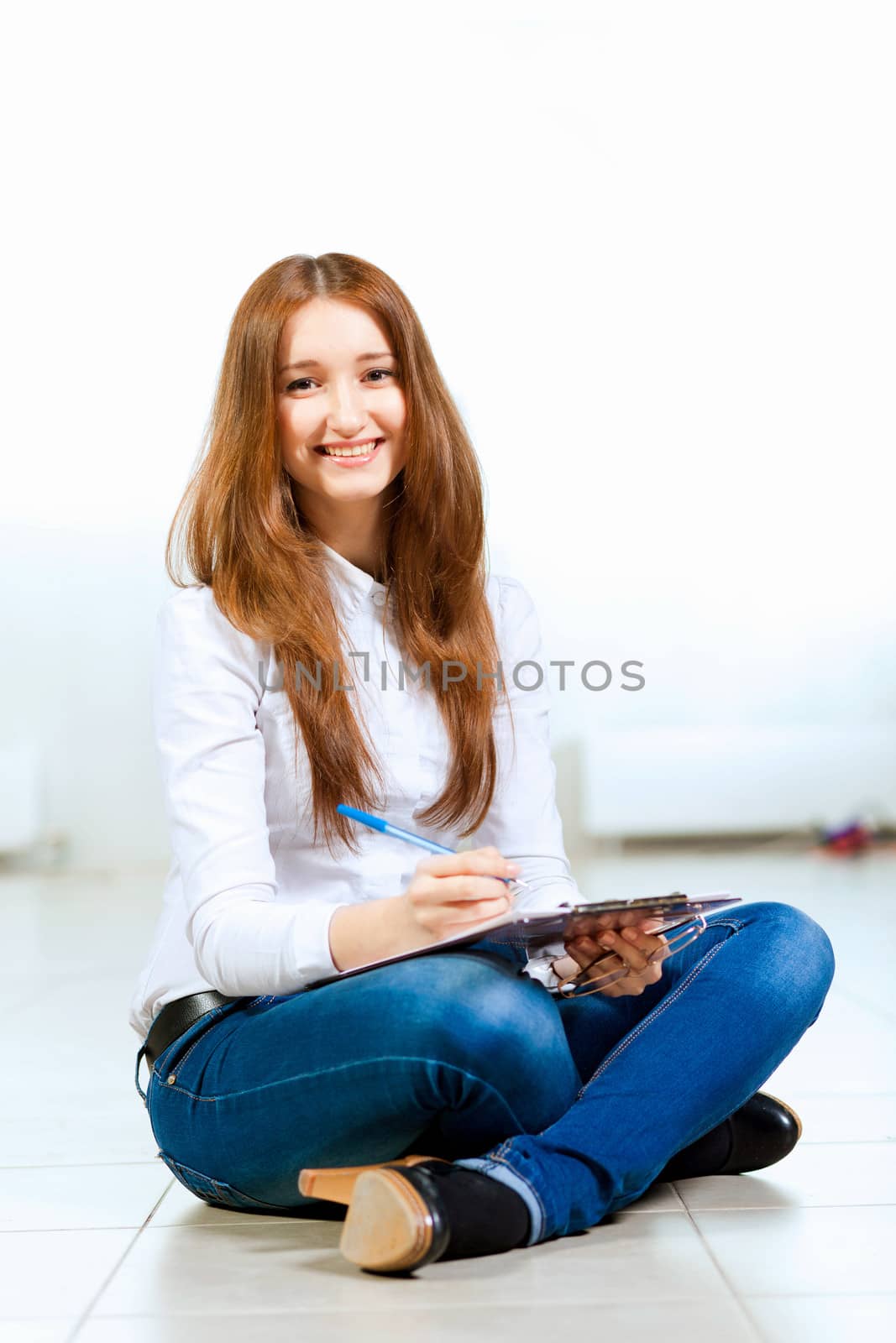 Image of young red hair woman in casual wear