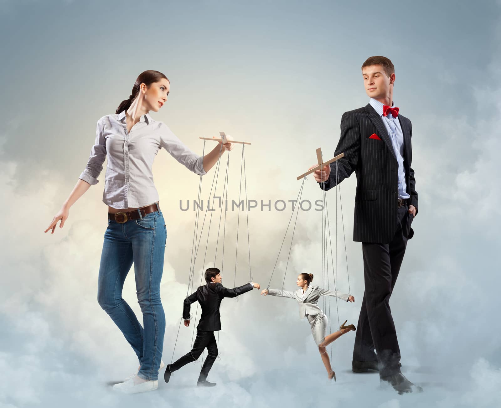 Image of man and woman with marionette puppets