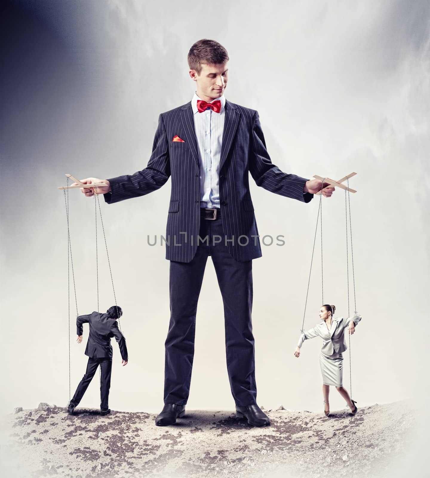 Businessman puppeteer by sergey_nivens