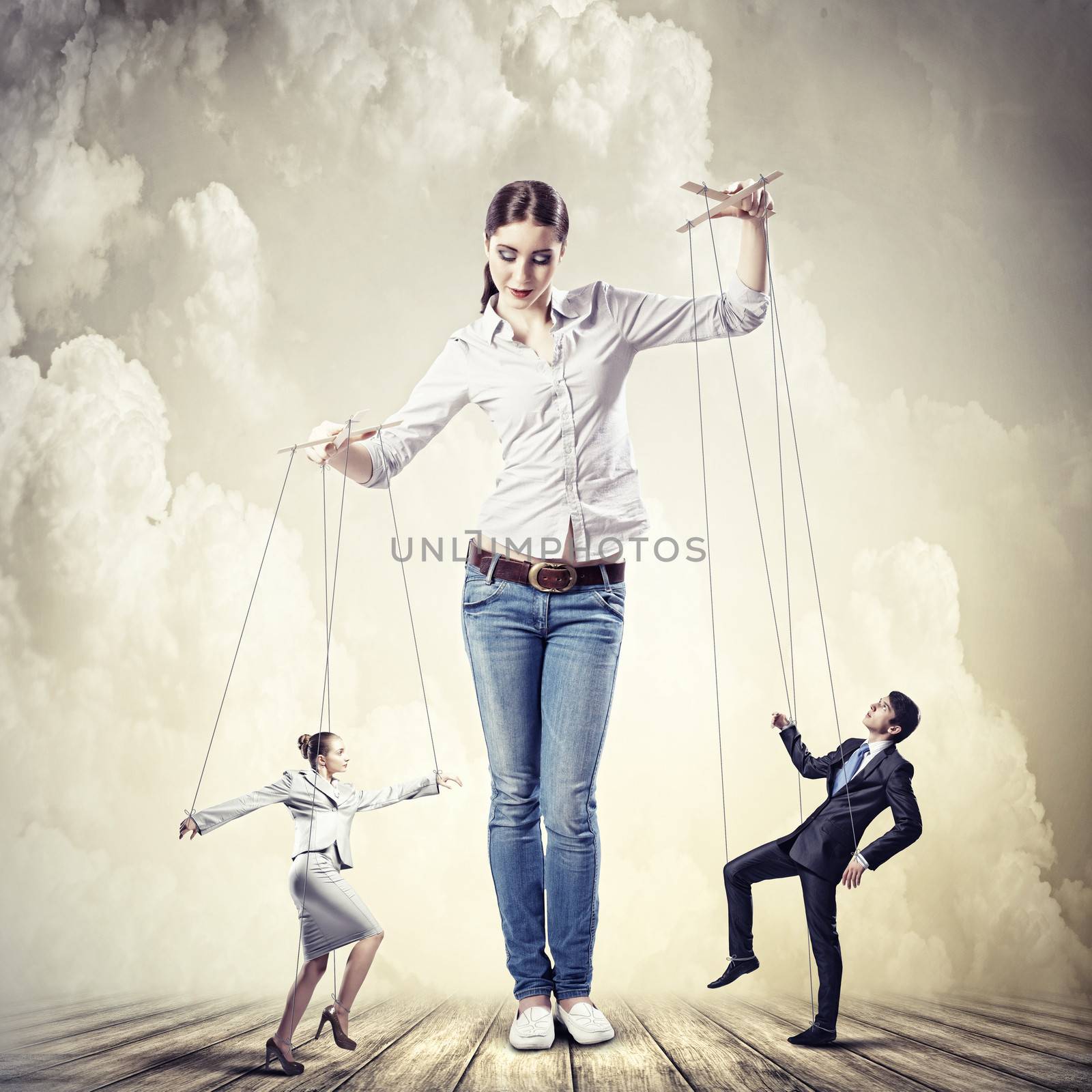 Image of pretty businesswoman puppeteer. Leadership concept