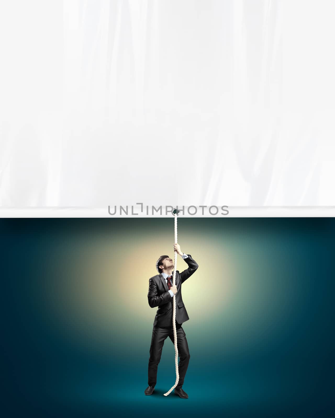 Businessman pulling blank banner by sergey_nivens