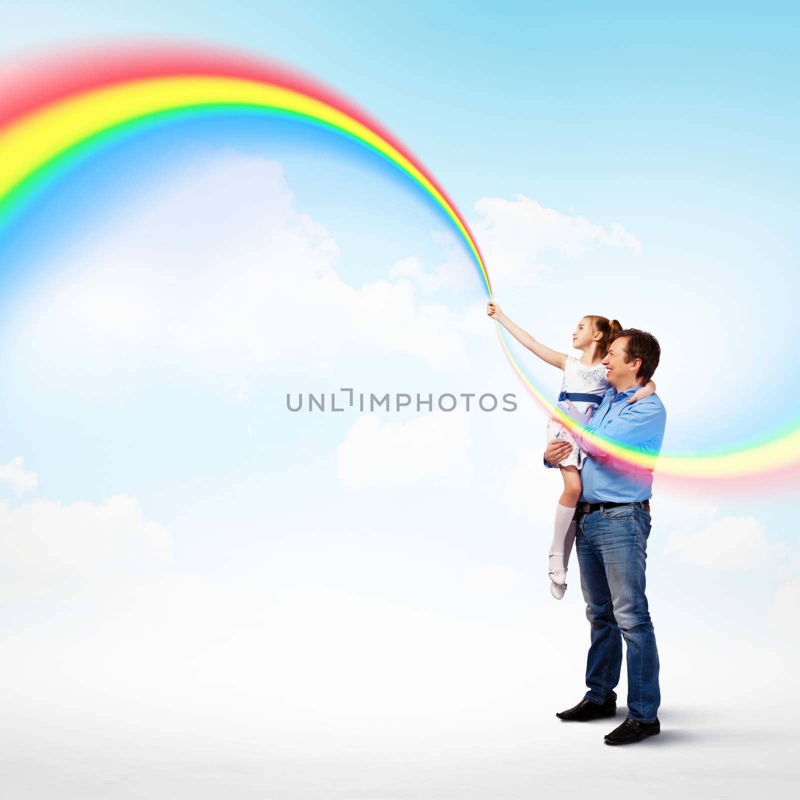 Father holding his daughter and rainbow by sergey_nivens