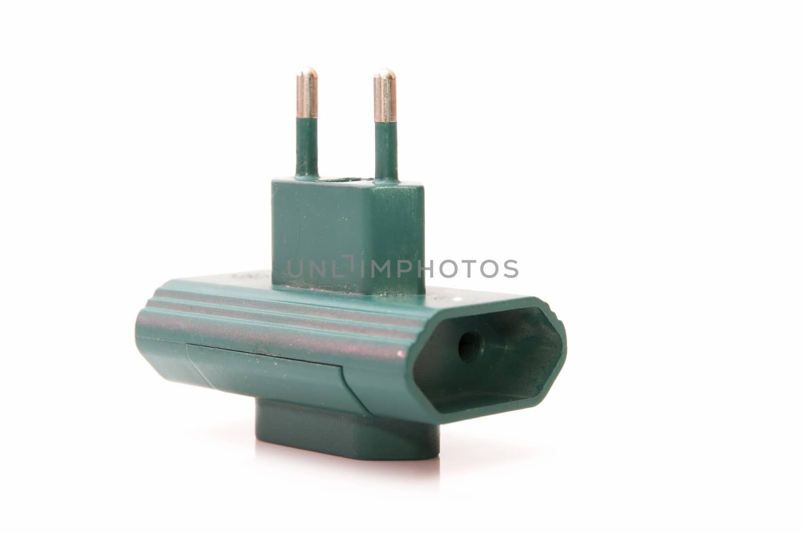green plug on a white background