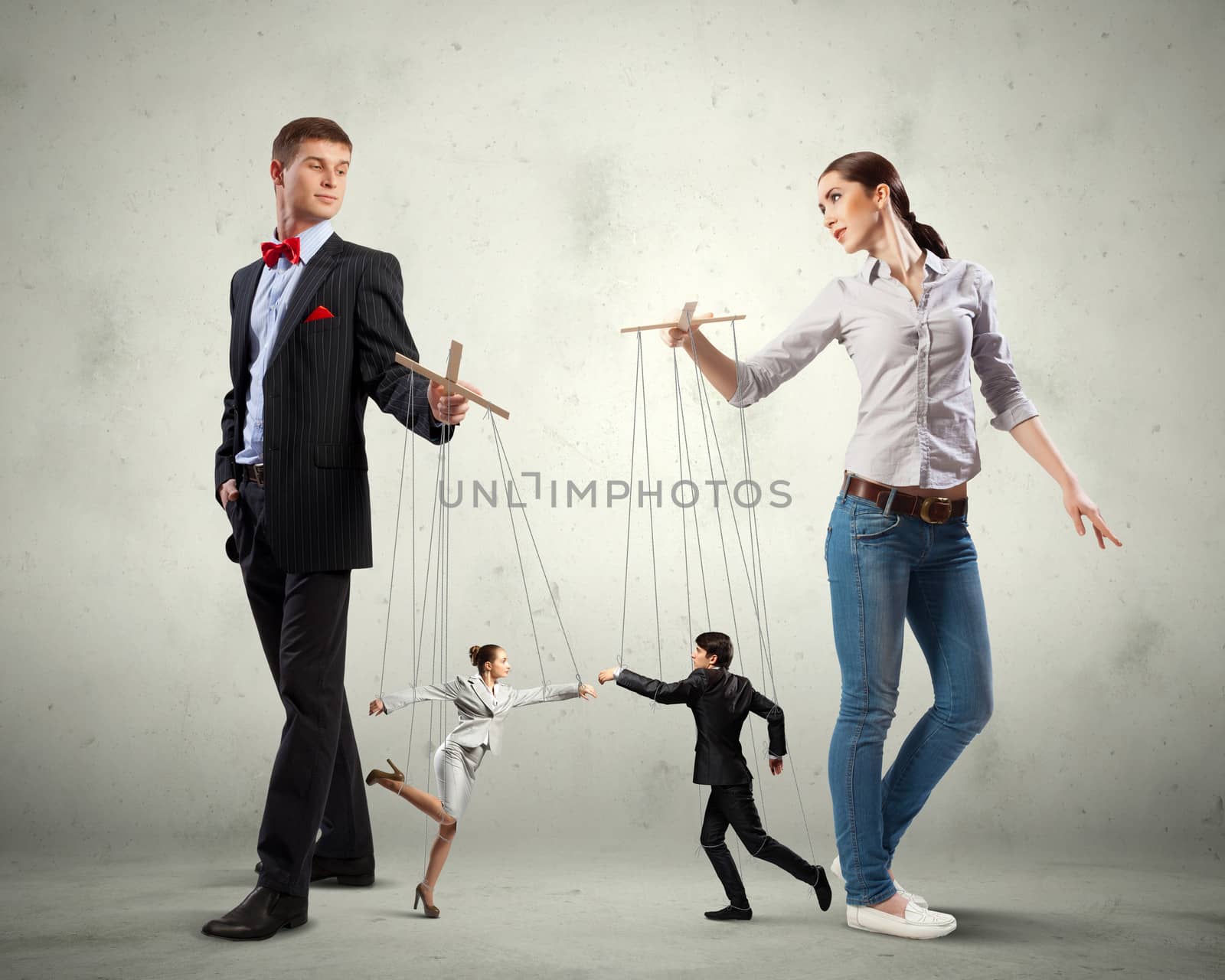 Image of man and woman with marionette puppets