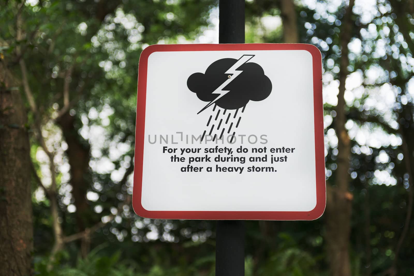 Storm warning sign in a modern park 