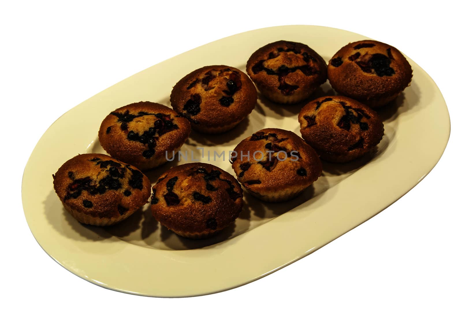 Homemade muffins on plate by varbenov