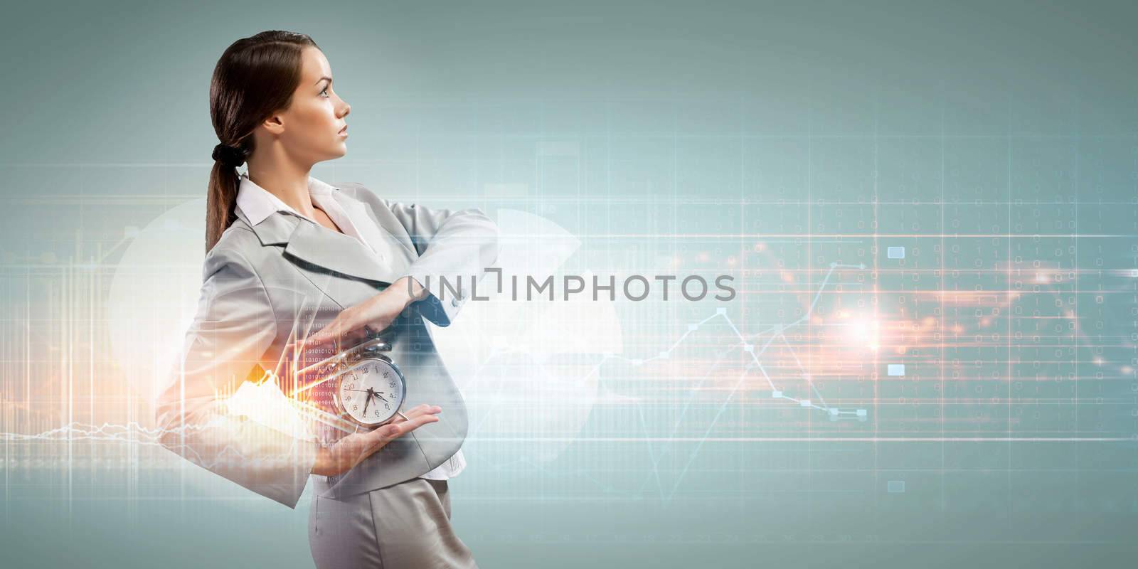 Image of businesswoman holding alarmclock against illustration background