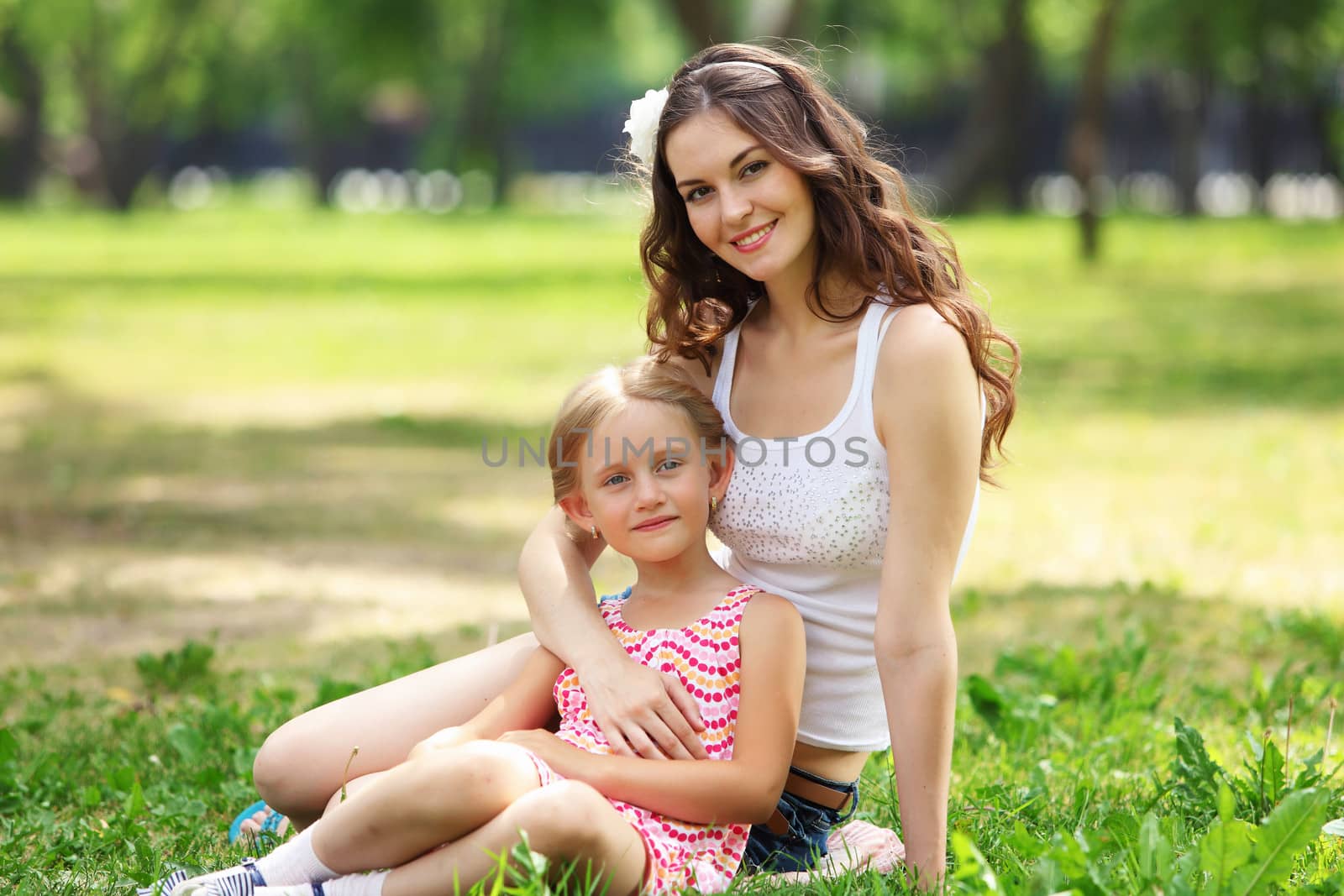 Mother and daughter in the park by sergey_nivens