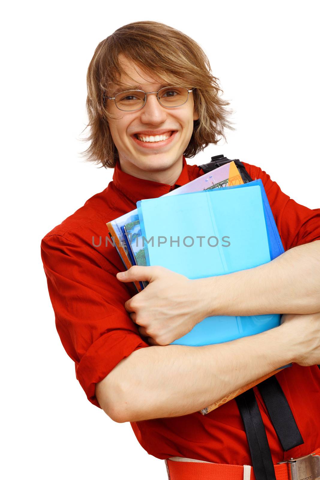 Happy smiling student standing and holding books