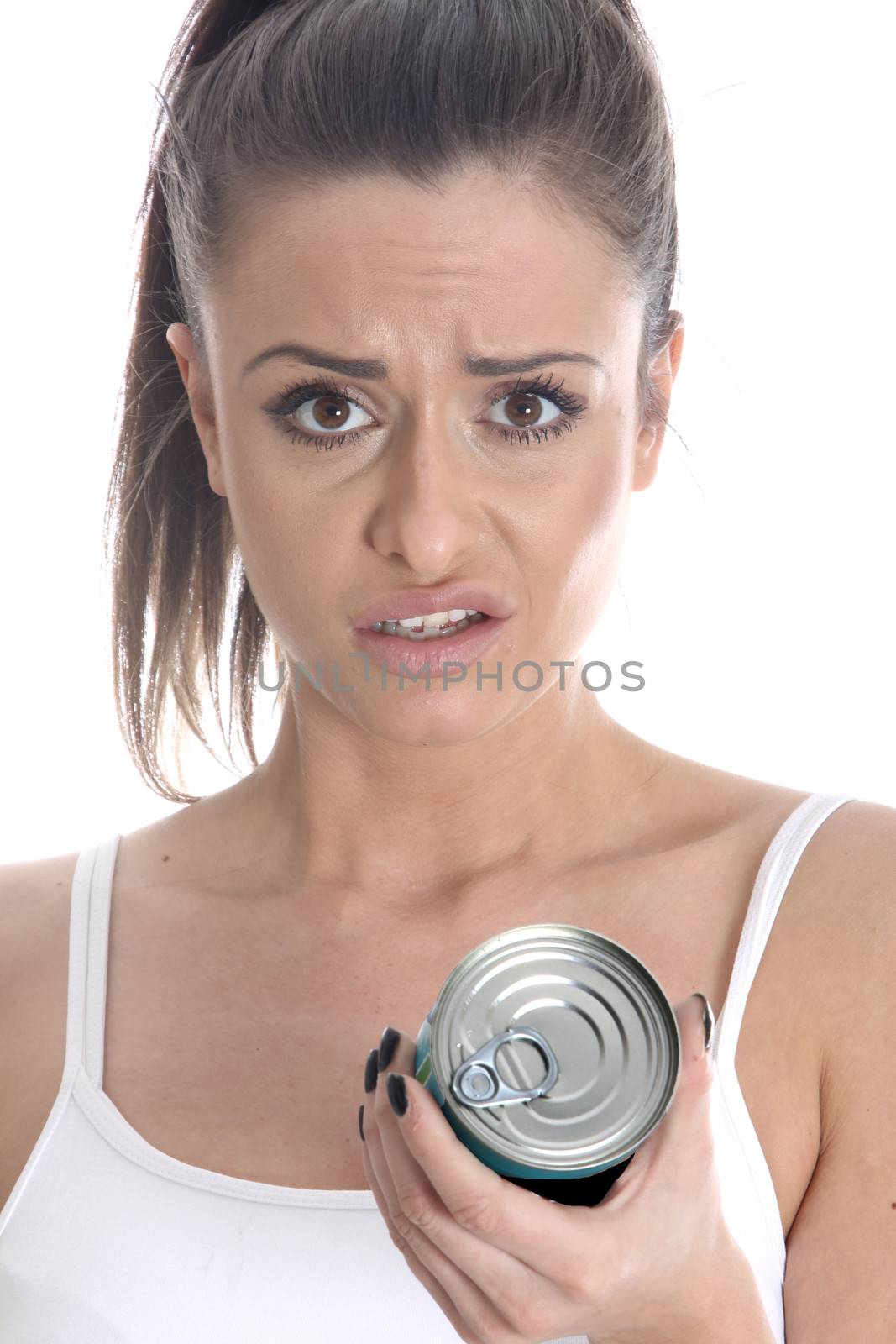 Model Released. Young Woman Checking Food Can