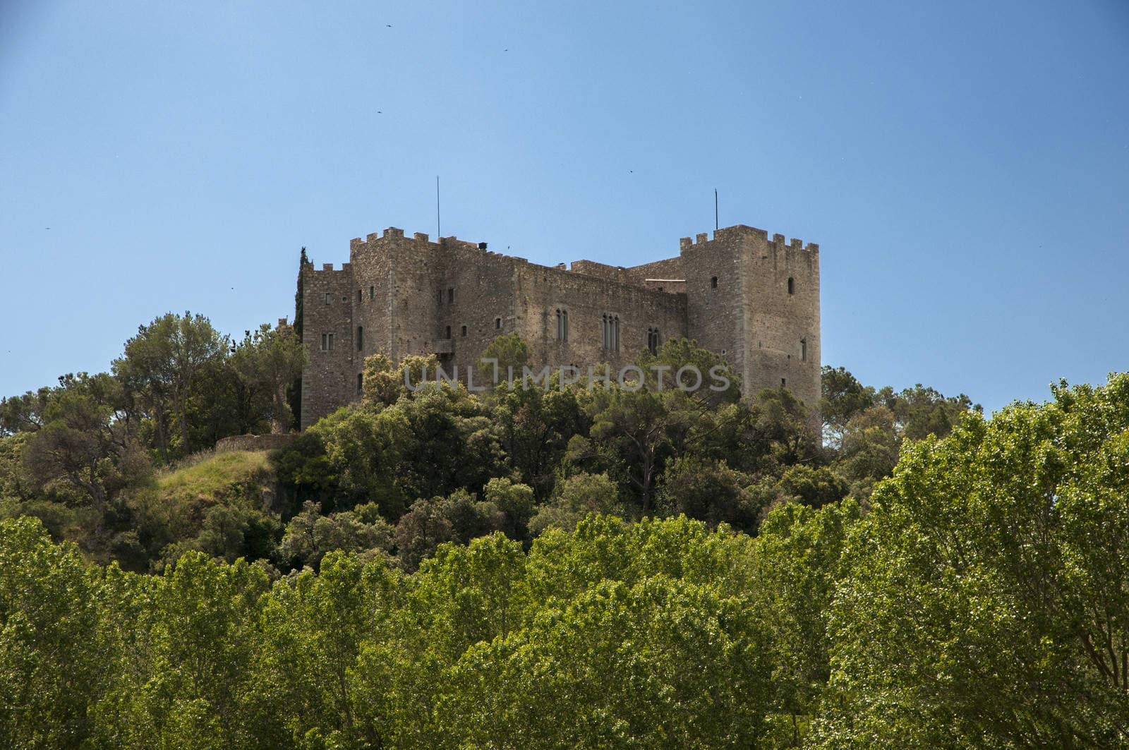 castle La Roca Del Valles located on top of the mountain